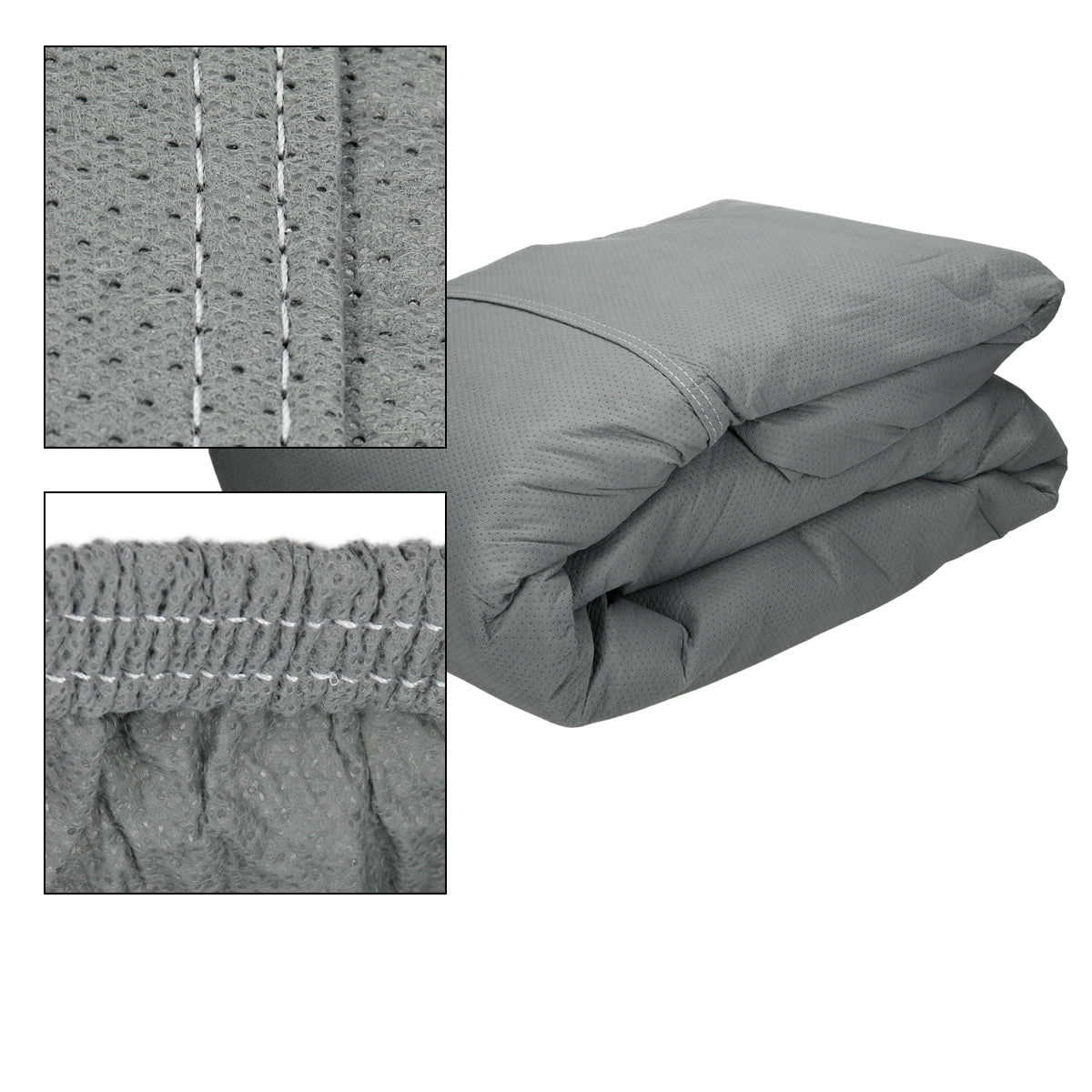 Coperta grigia piegata con cuciture e pieghe visibili.