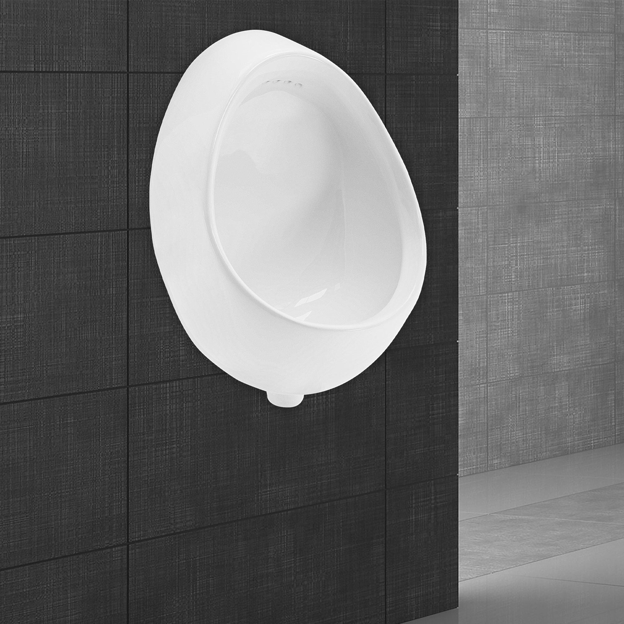 Wall-mounted urinal in a modern, oval shape on a wall.