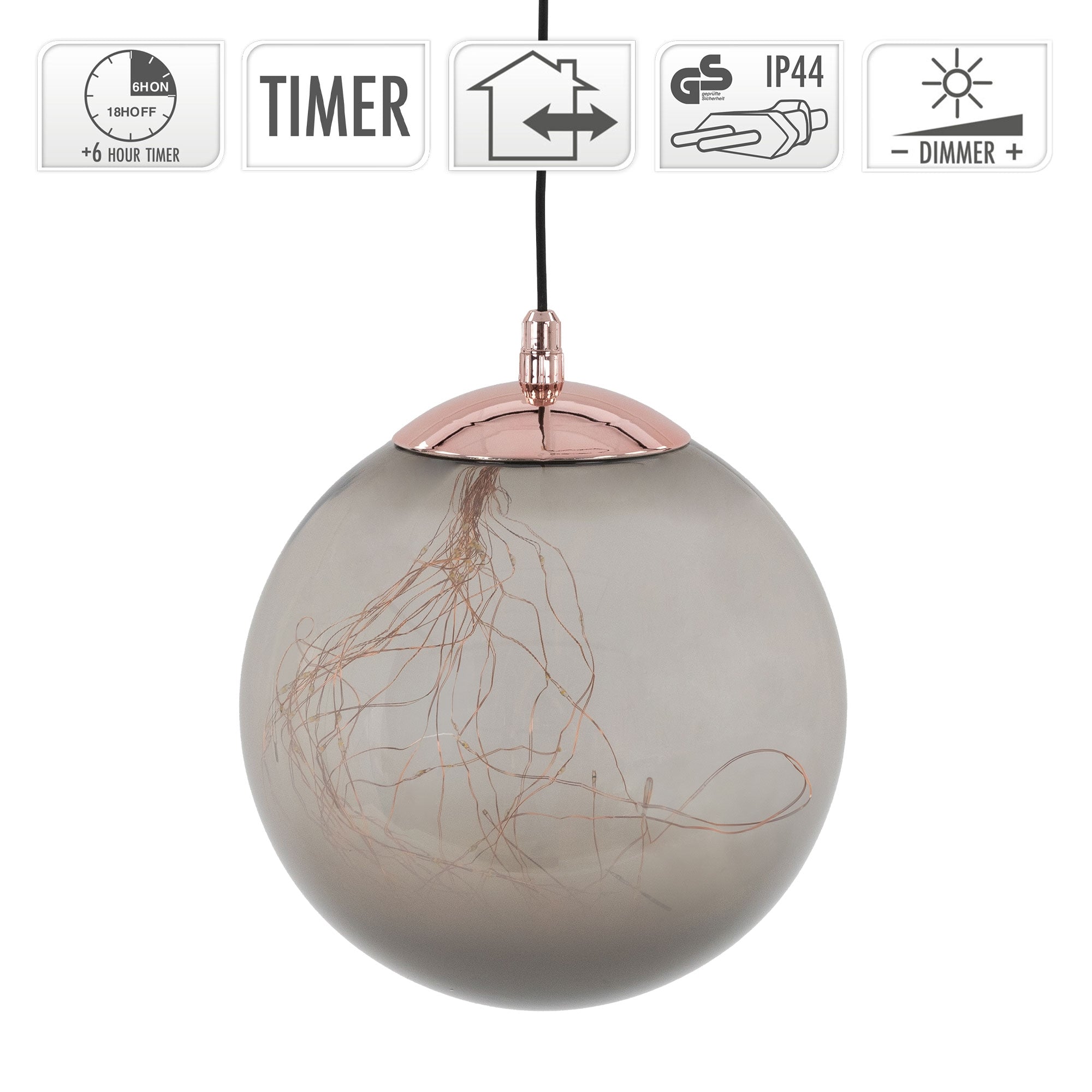 Zavěšená lampa s kulatým, šedým skleněným povrchem a měděným víčkem.