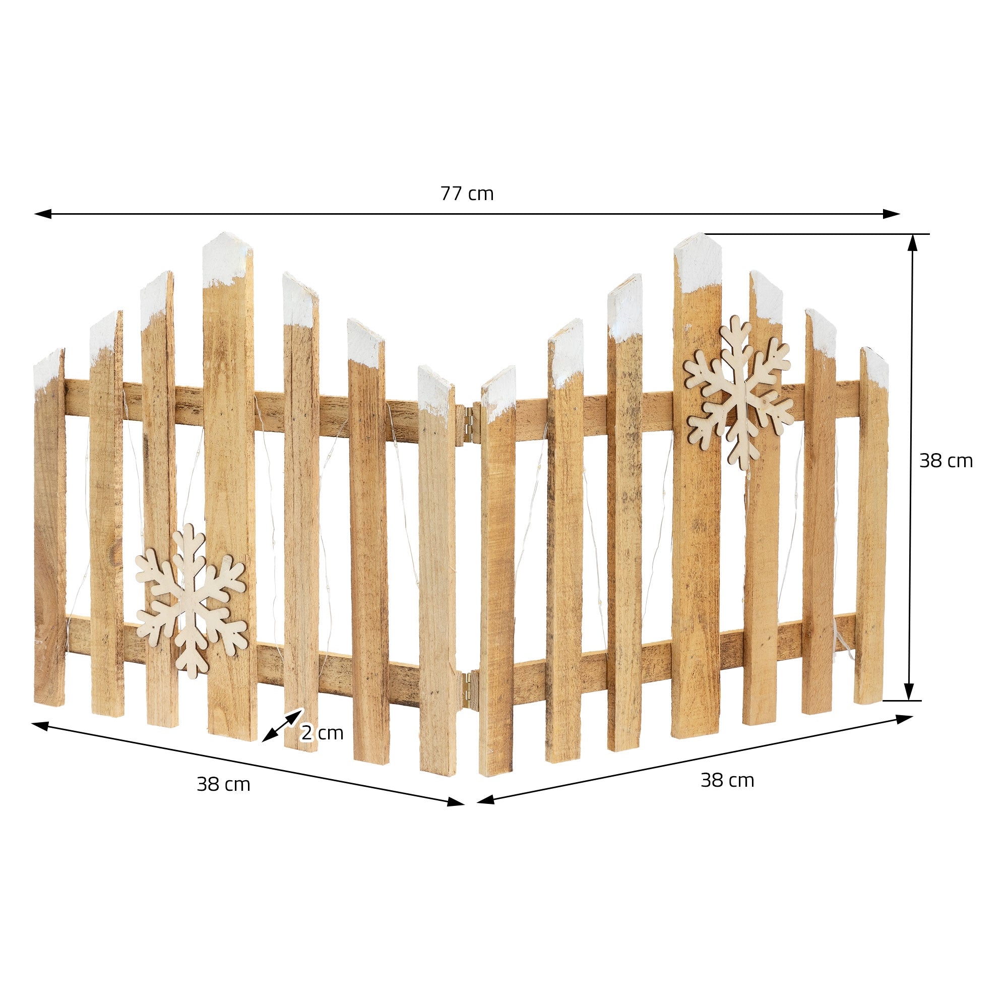 Houten hek met witte punten en sneeuwvlokken-decoratie.