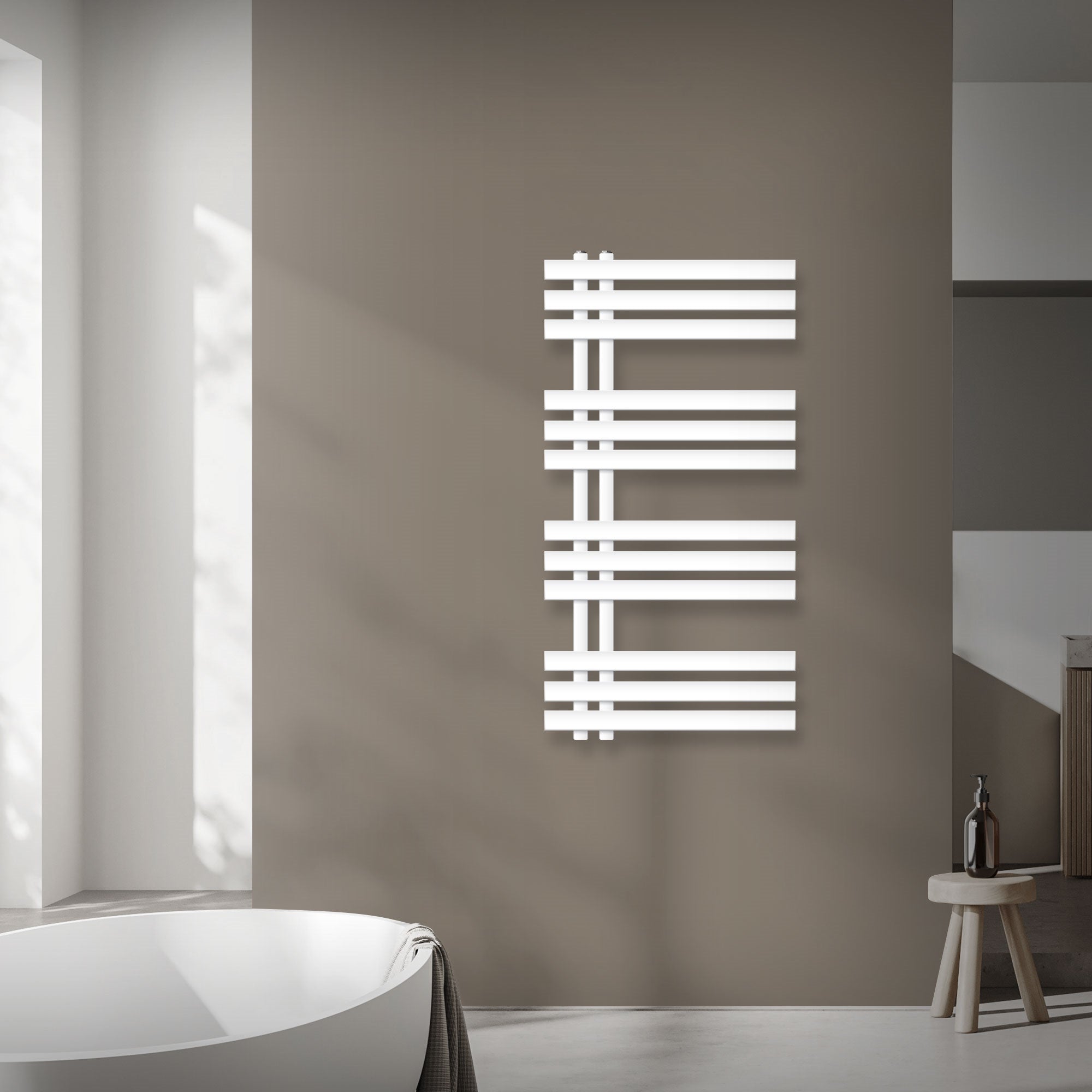 White towel radiator on a wall in a modern bathroom.