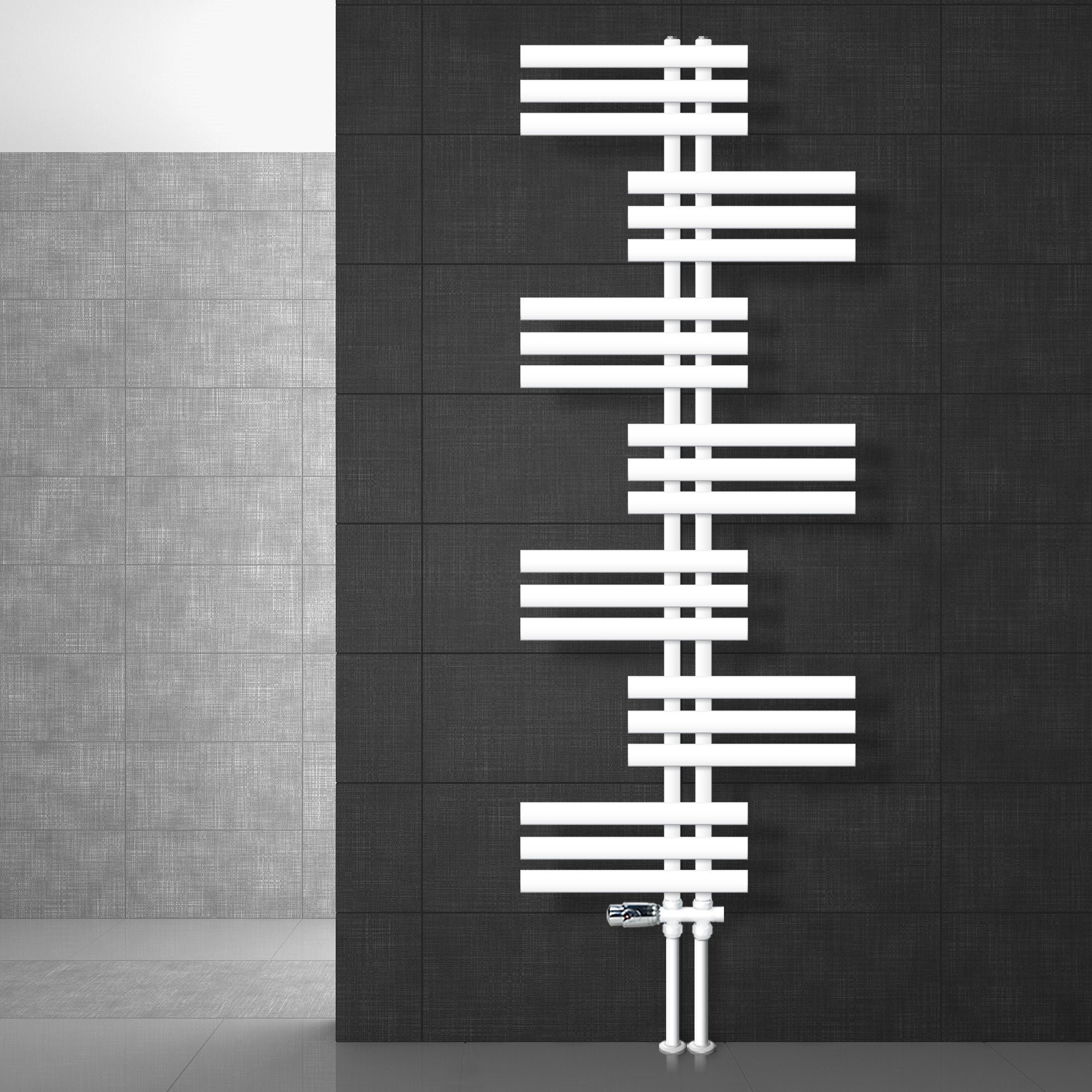 Disposición de radiadores blancos en una pared oscura.