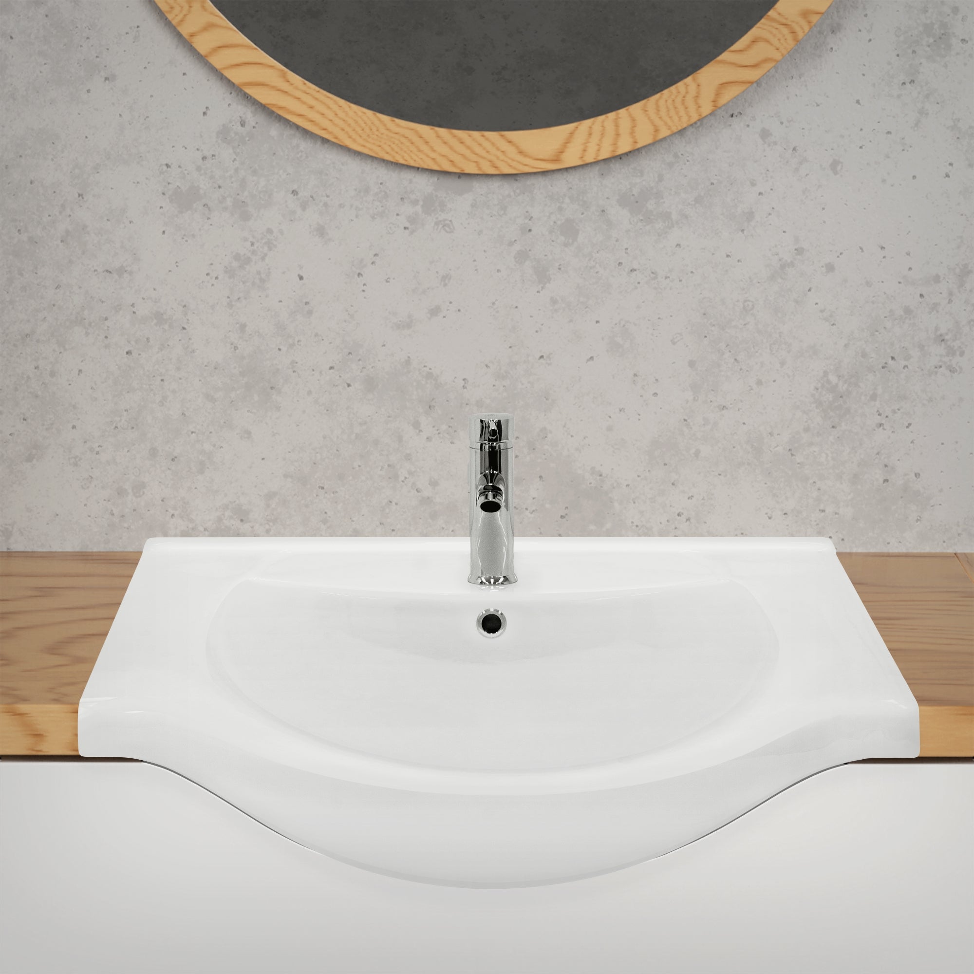 Pesuallas hanalla, puupinnalla ja pyöreällä peilillä taustalla.