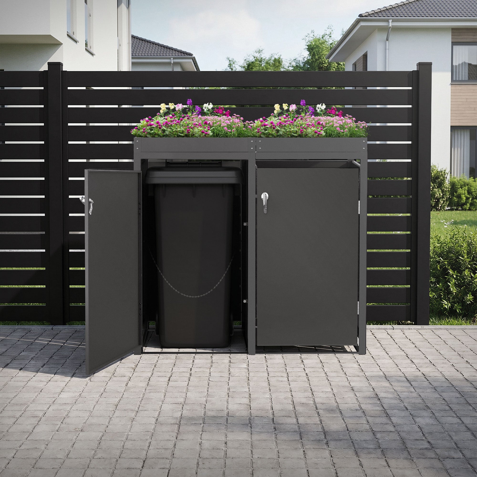 Waste bin box in the garden with blooming plants and open access.