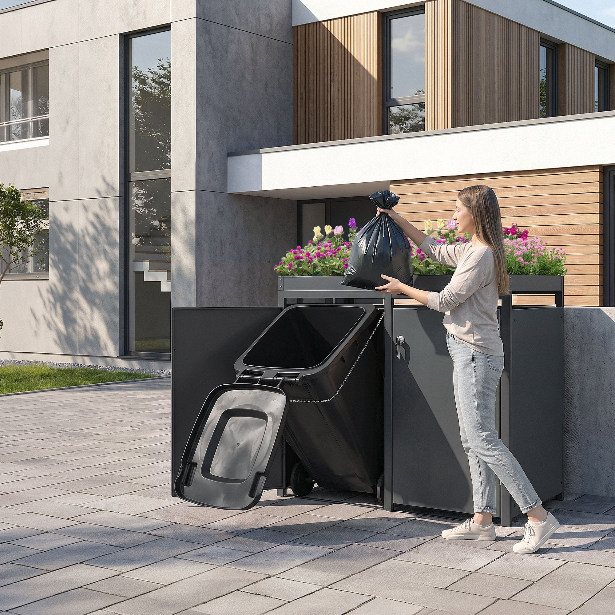 A person throws a trash bag into a trash can in front of a moder