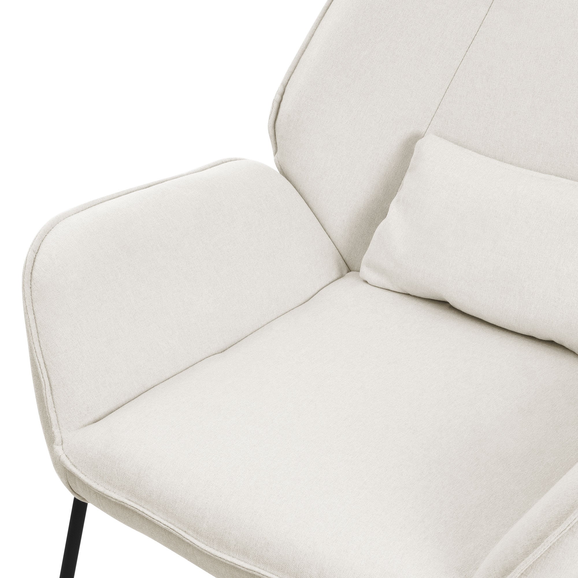 Detail view of a white reclining armchair with cushion.