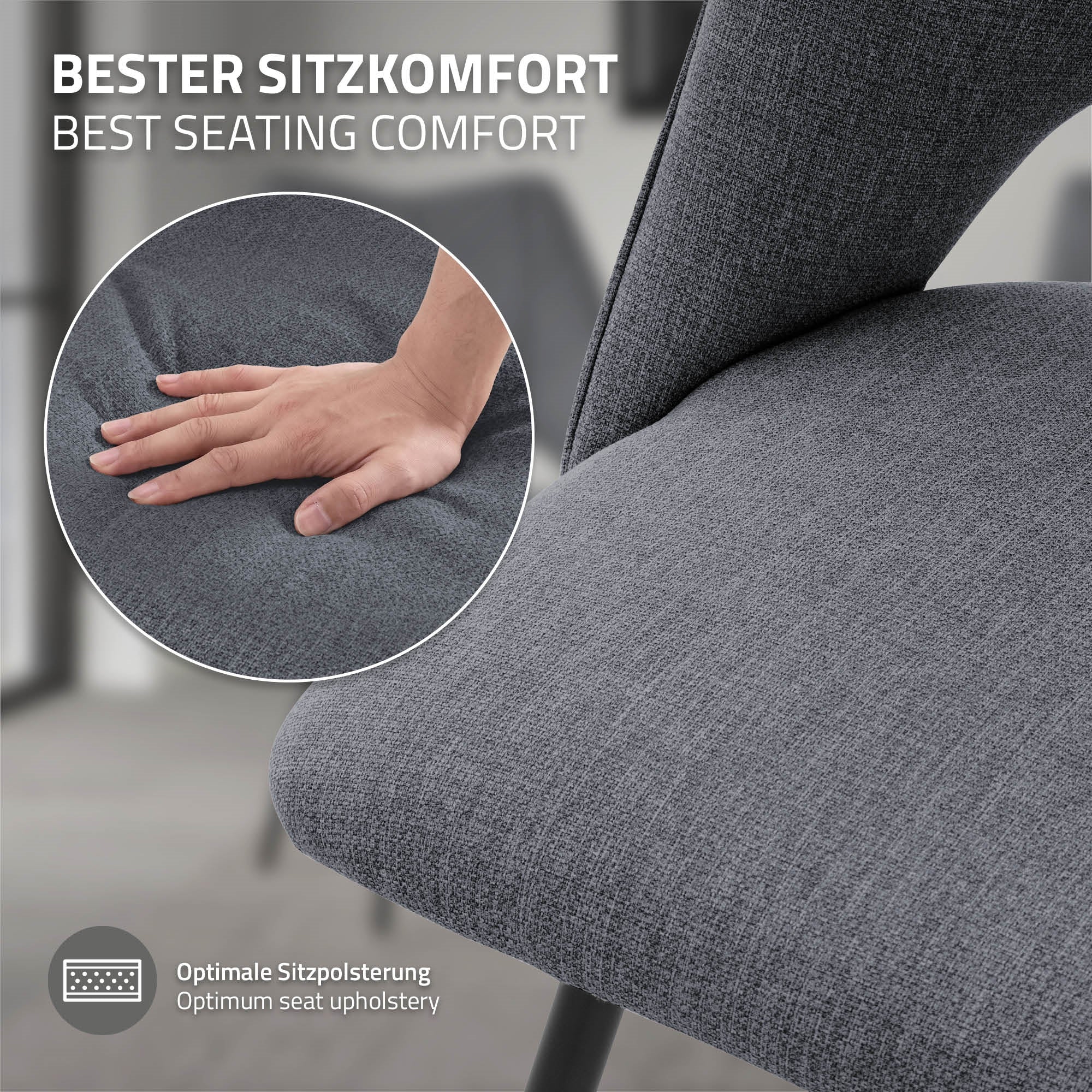 Nahaufnahme einer grauen Stuhlsitzfläche mit einer Hand darauf.