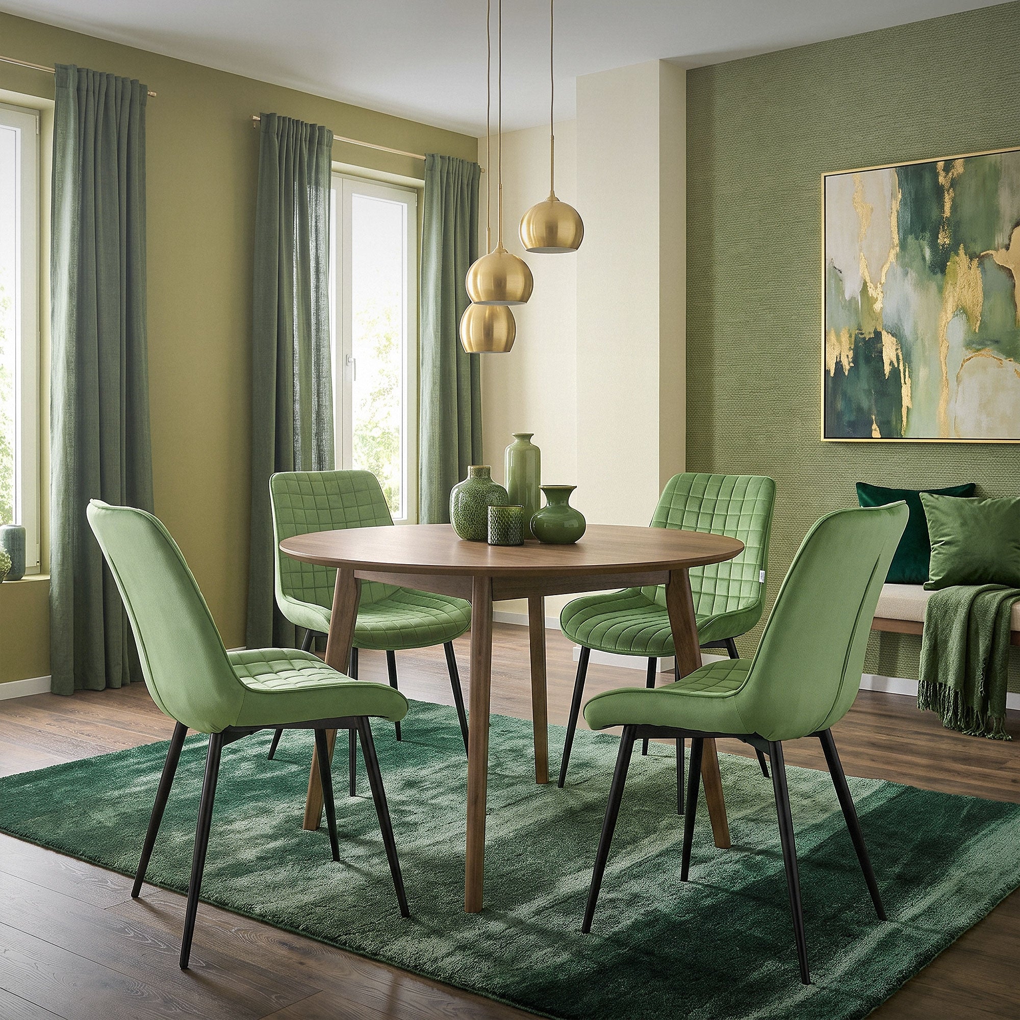 A round table with green chairs in a room with large windows.