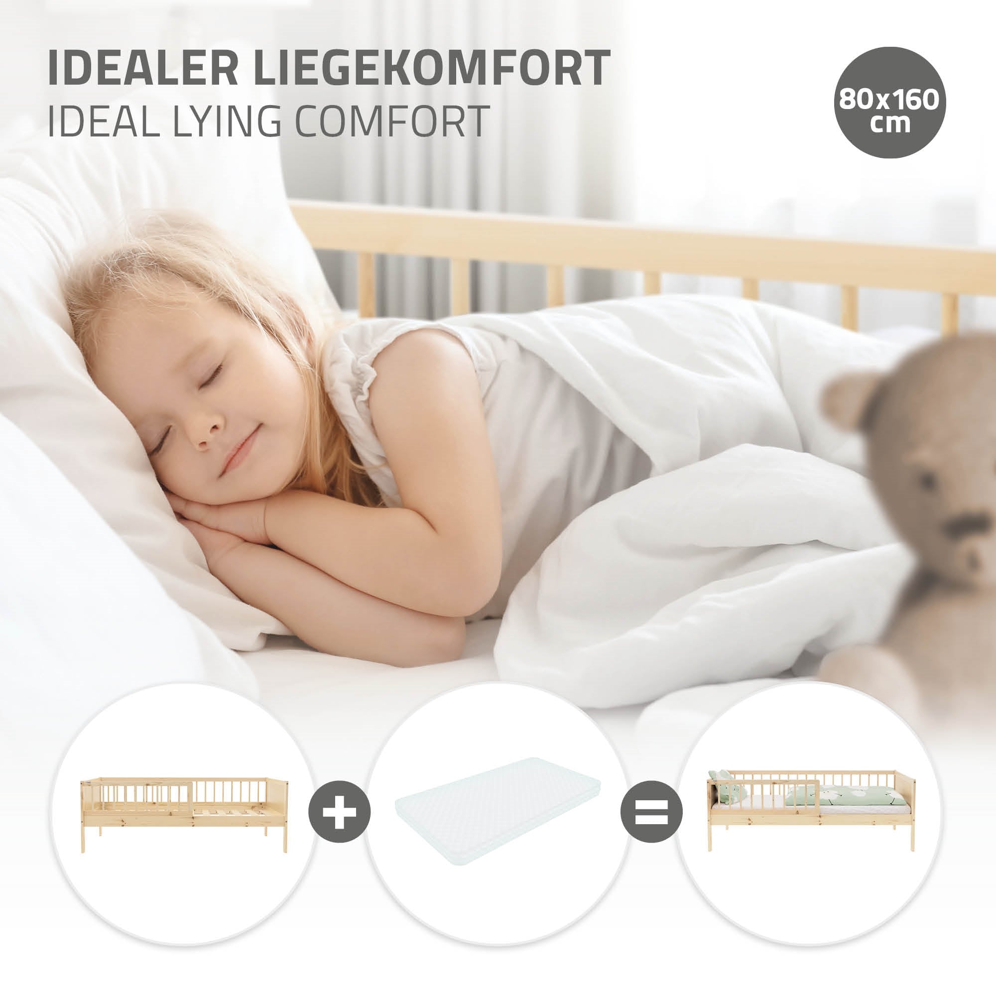 Een slapend kind in een bed met een matras en een knuffeldier.