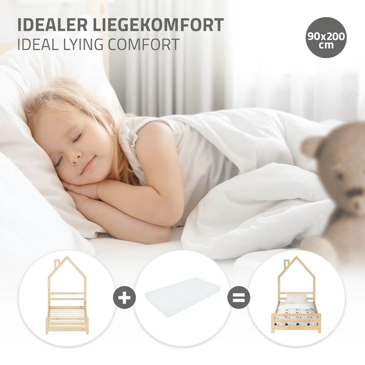 Schlafendes Kind auf einem Bett mit Matratze und Decke.