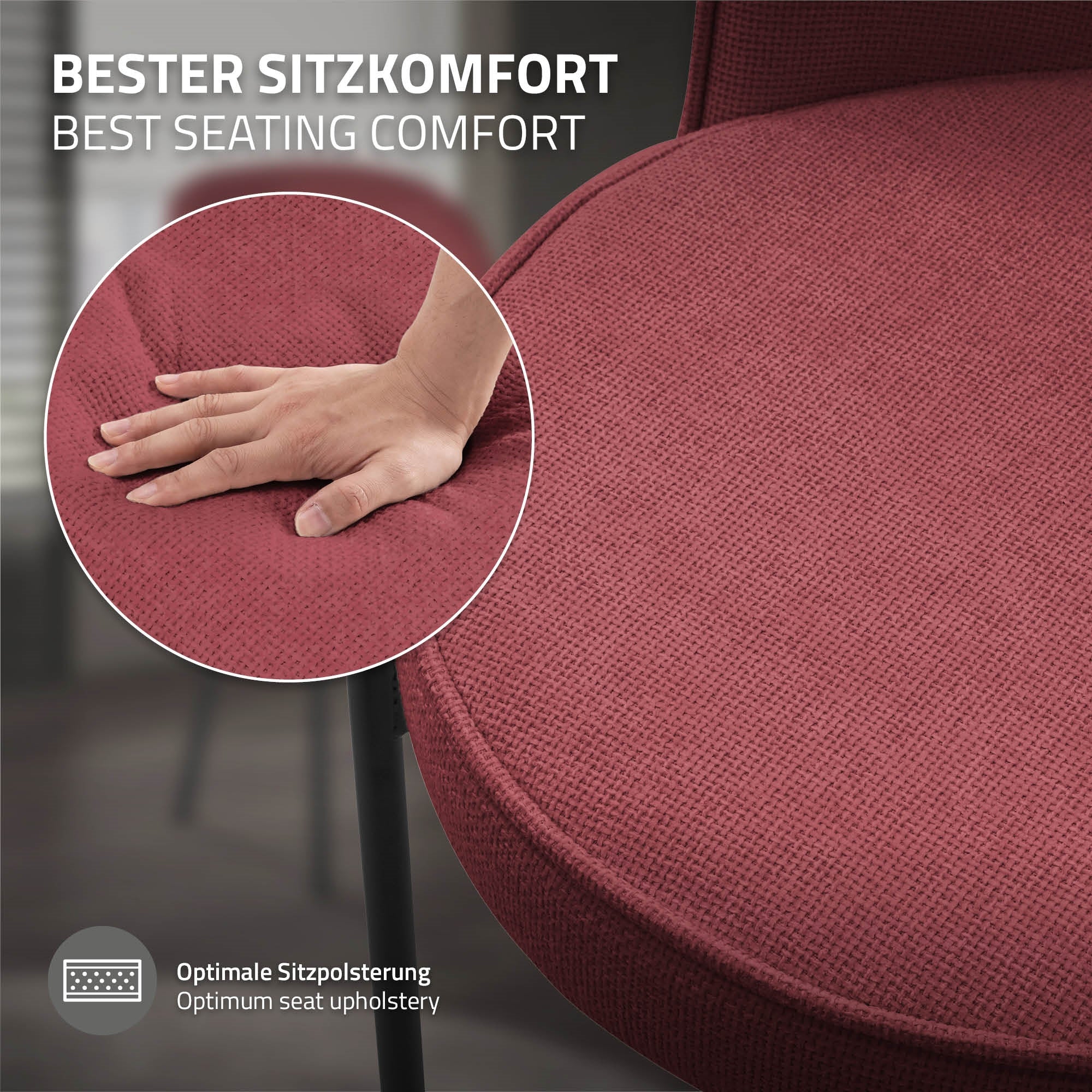 Detailní záběr červeného stolu s rukou, která testuje polstrování.