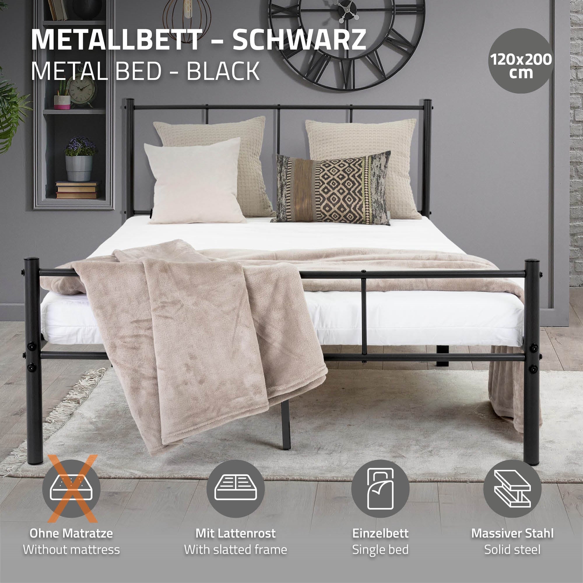 Letto in metallo nero con cuscini e coperte su un materasso.