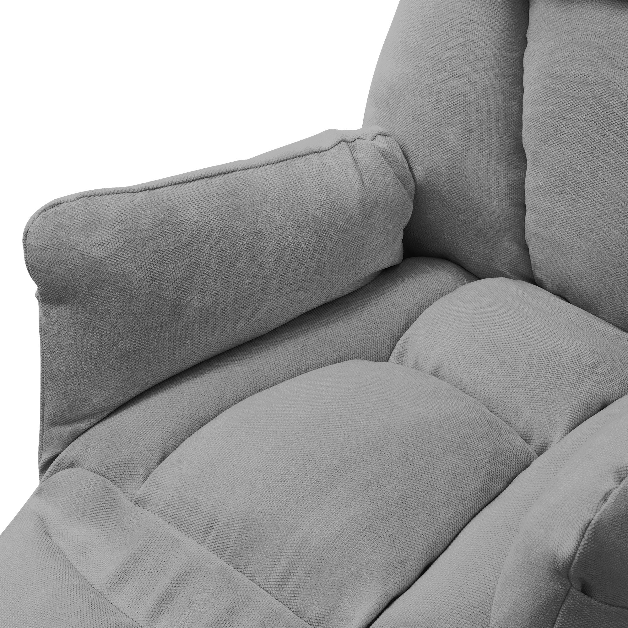 Nahaufnahme eines grauen Sofas mit Armlehne.