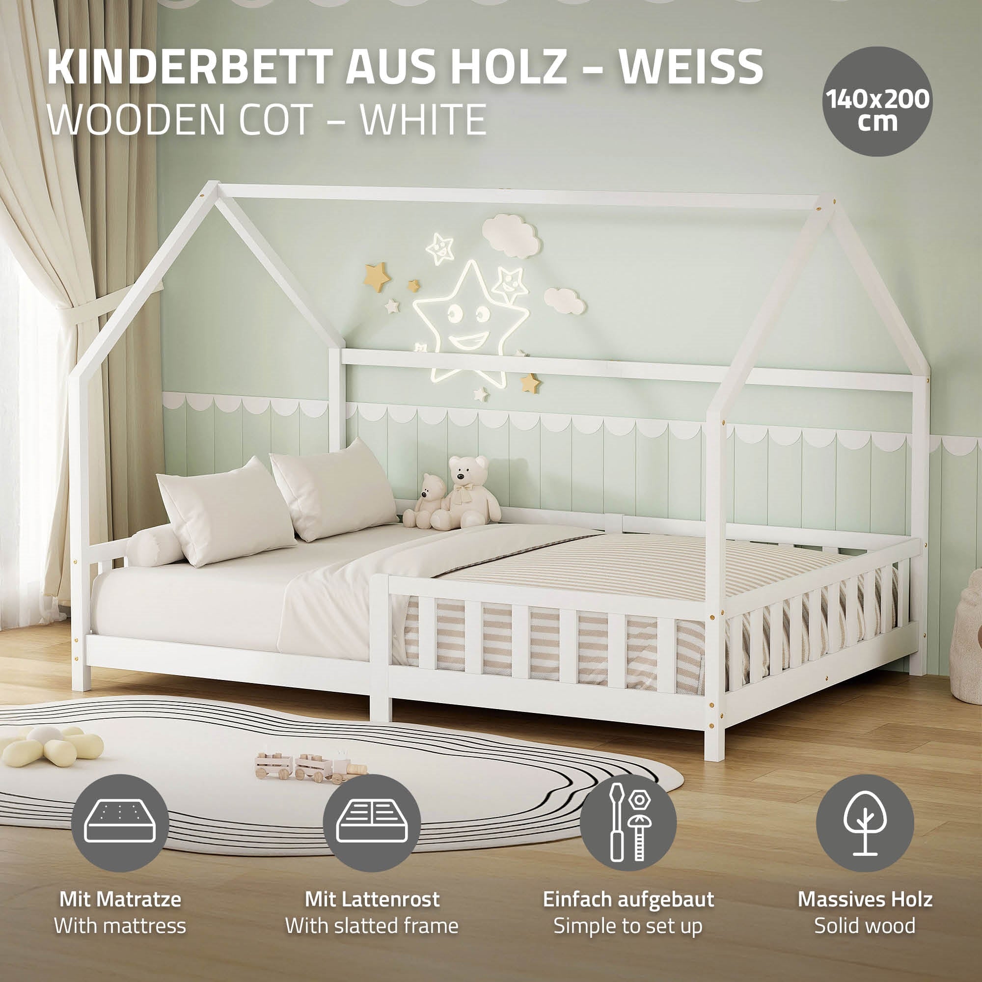 A white children's bed with mattress and slatted frame.
