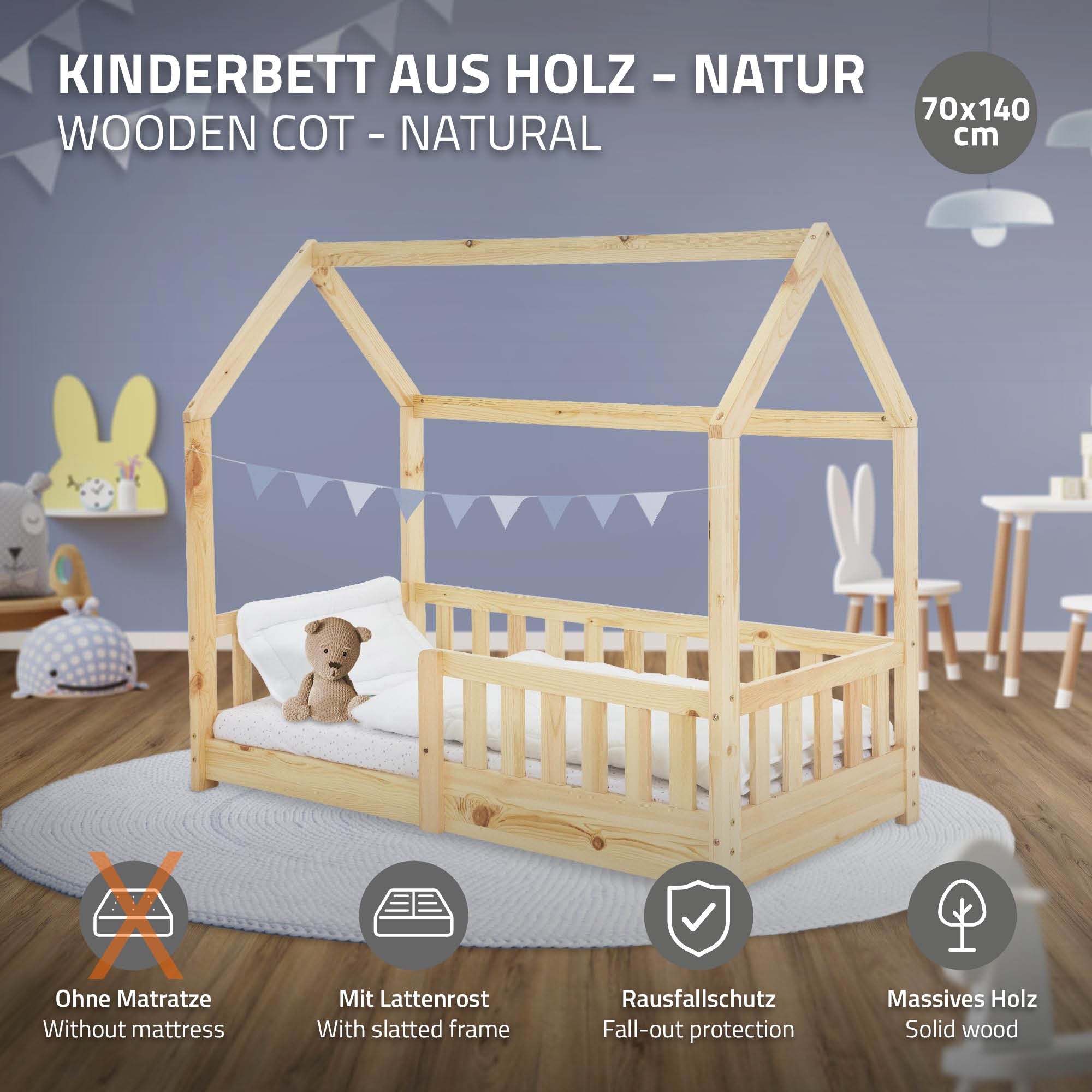 Holz-Kinderbett in Weiß mit Matratze und Rausfallschutz.