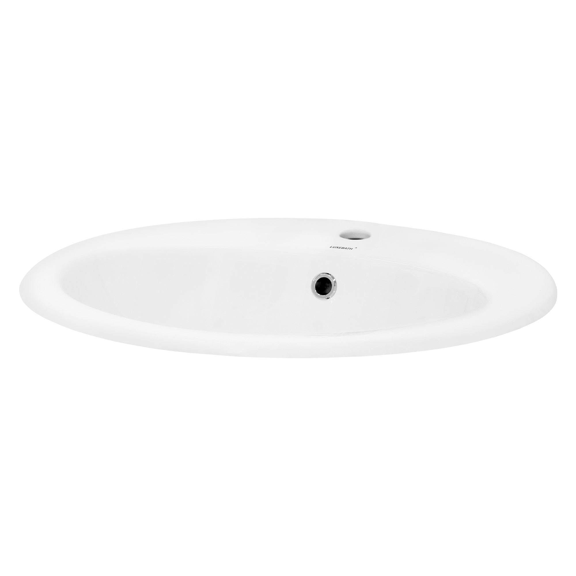 Baignoire ronde blanche avec un trou de drainage.