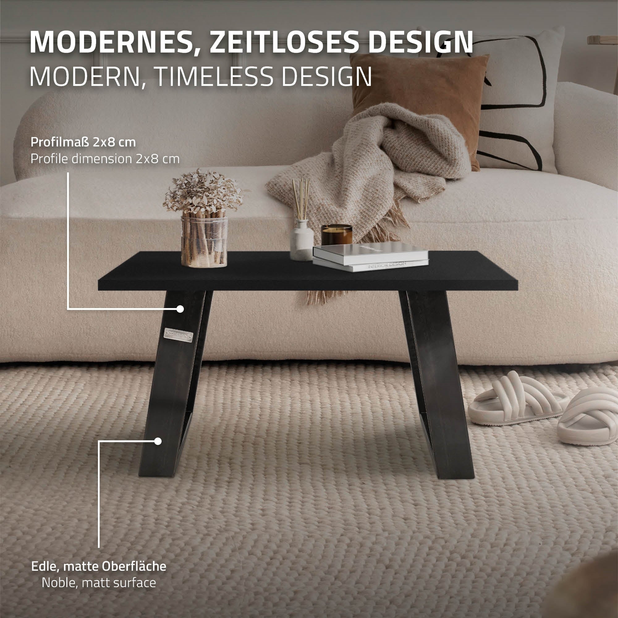 Black table with a matte finish on a light carpet.