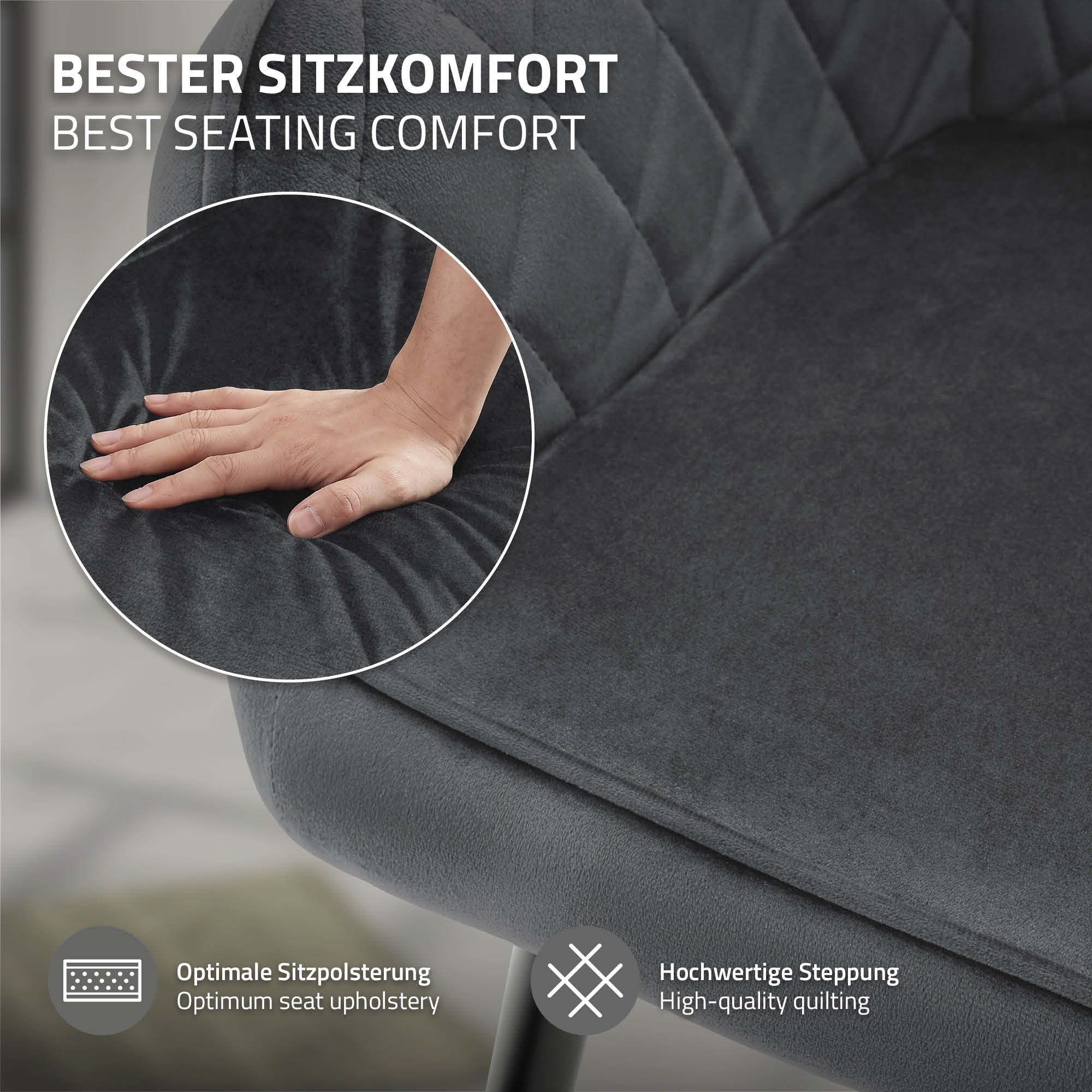 Nahaufnahme eines grauen Stuhls mit einer Hand, die die Polsterung berührt.