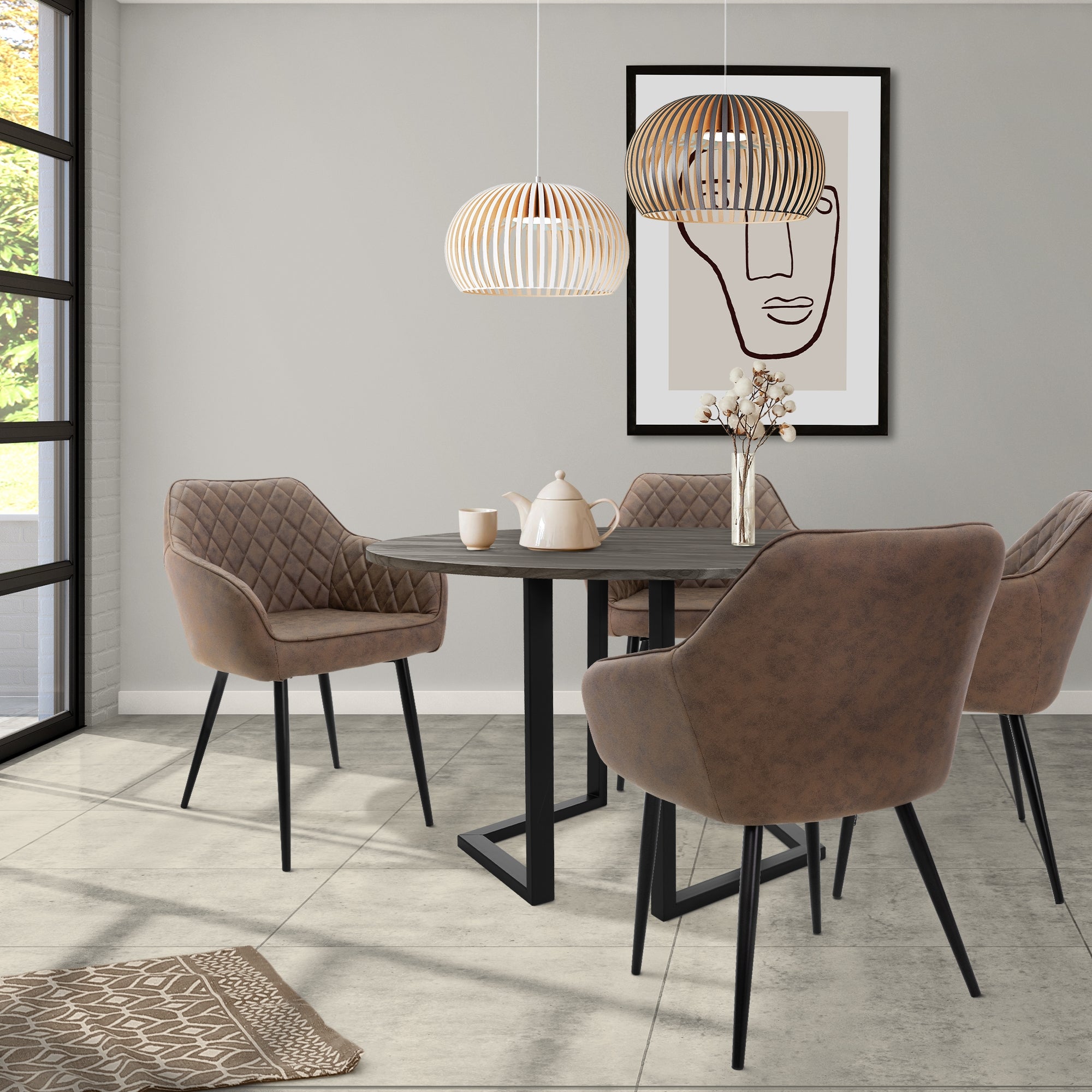 Une salle à manger avec une table ronde, des chaises et une lampe moderne.