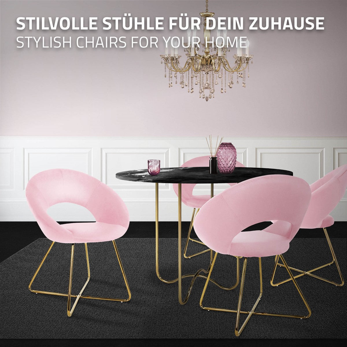 Rosa Stühle um einen schwarzen Tisch in einem stilvollen Essbereich.