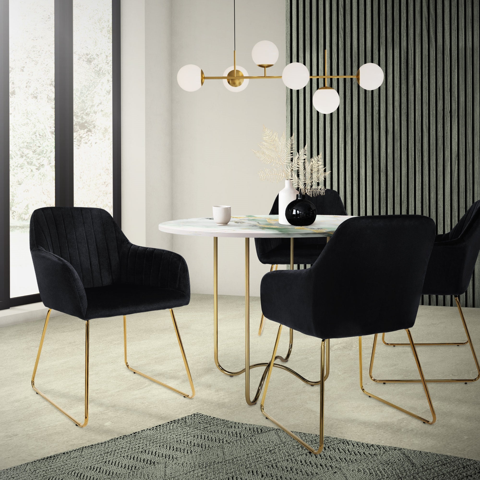 Een moderne eetruimte met een ronde tafel en vier zwarte stoelen.