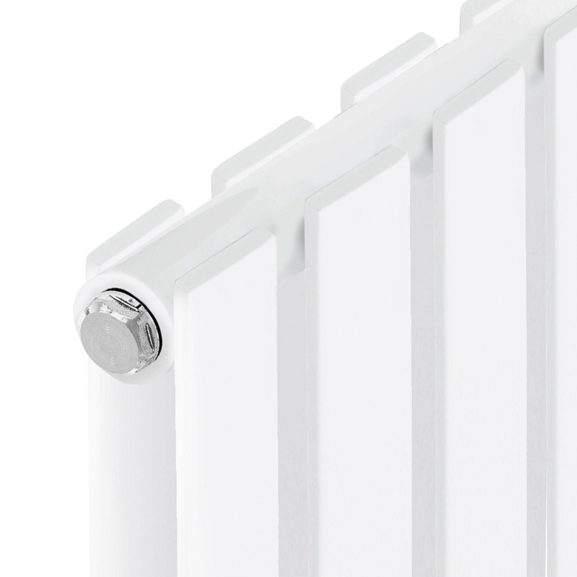 Close-up of a white radiator with a visible valve.