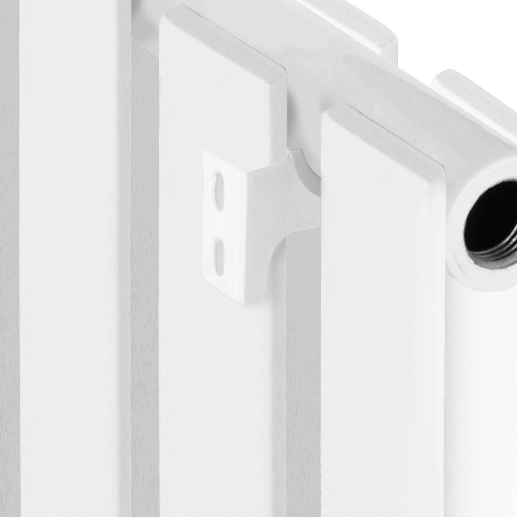 Close-up view of a white heating panel with a bracket.