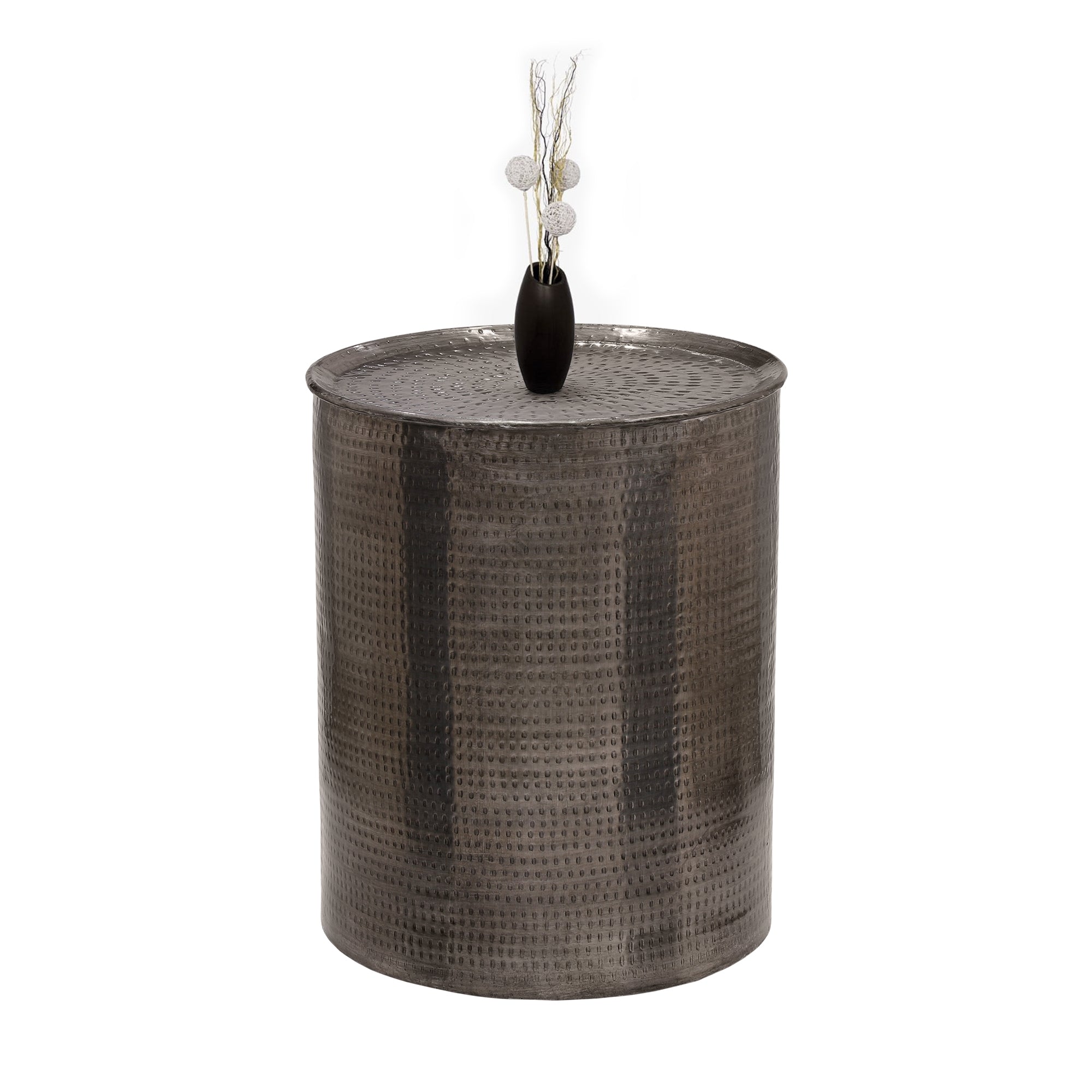 Table d'appoint ronde grise avec un vase noir et une décoration.