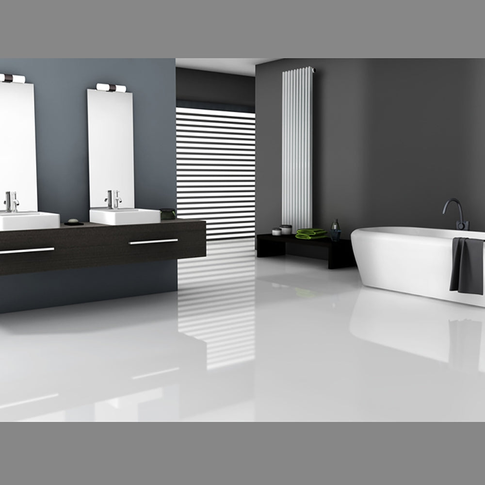 Modern bathroom with two mirrors, sinks, and a freestanding bathtub.