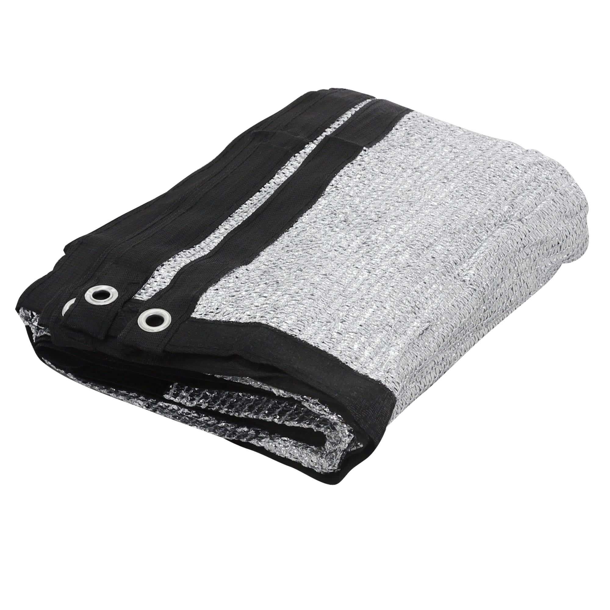 Un tissu plié argenté avec des rayures noires et des œillets.