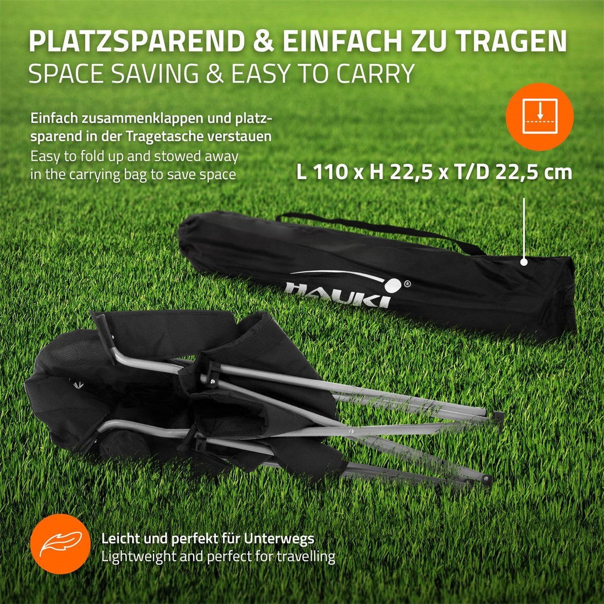 A folded camping chair in a carrying bag on green grass.