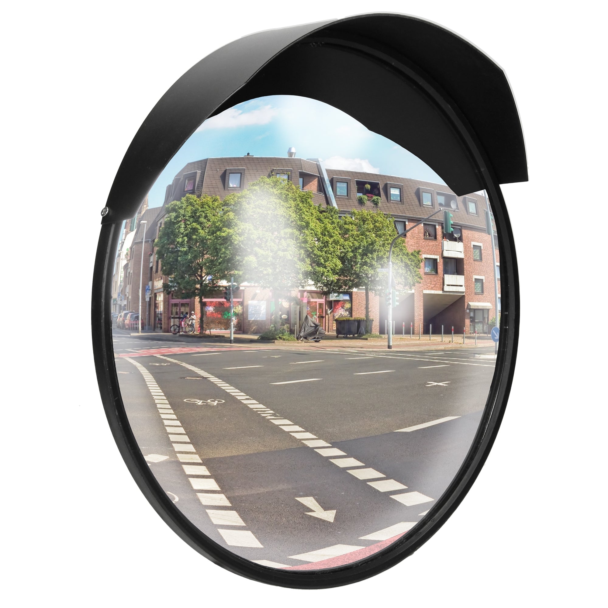 Runder Verkehrsspiegel mit schwarzem Rahmen, Blick auf eine Straße und Gebäude im Hintergrund.