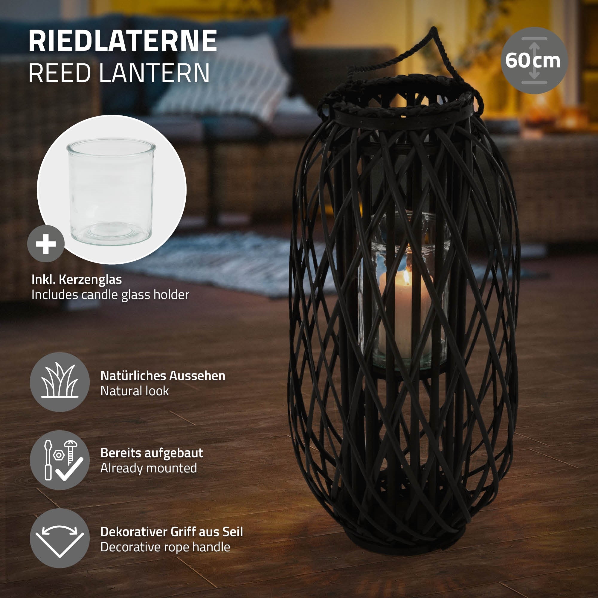 Lanterne noire en roseau avec verre à bougie, poignée décorative et matériaux naturels.