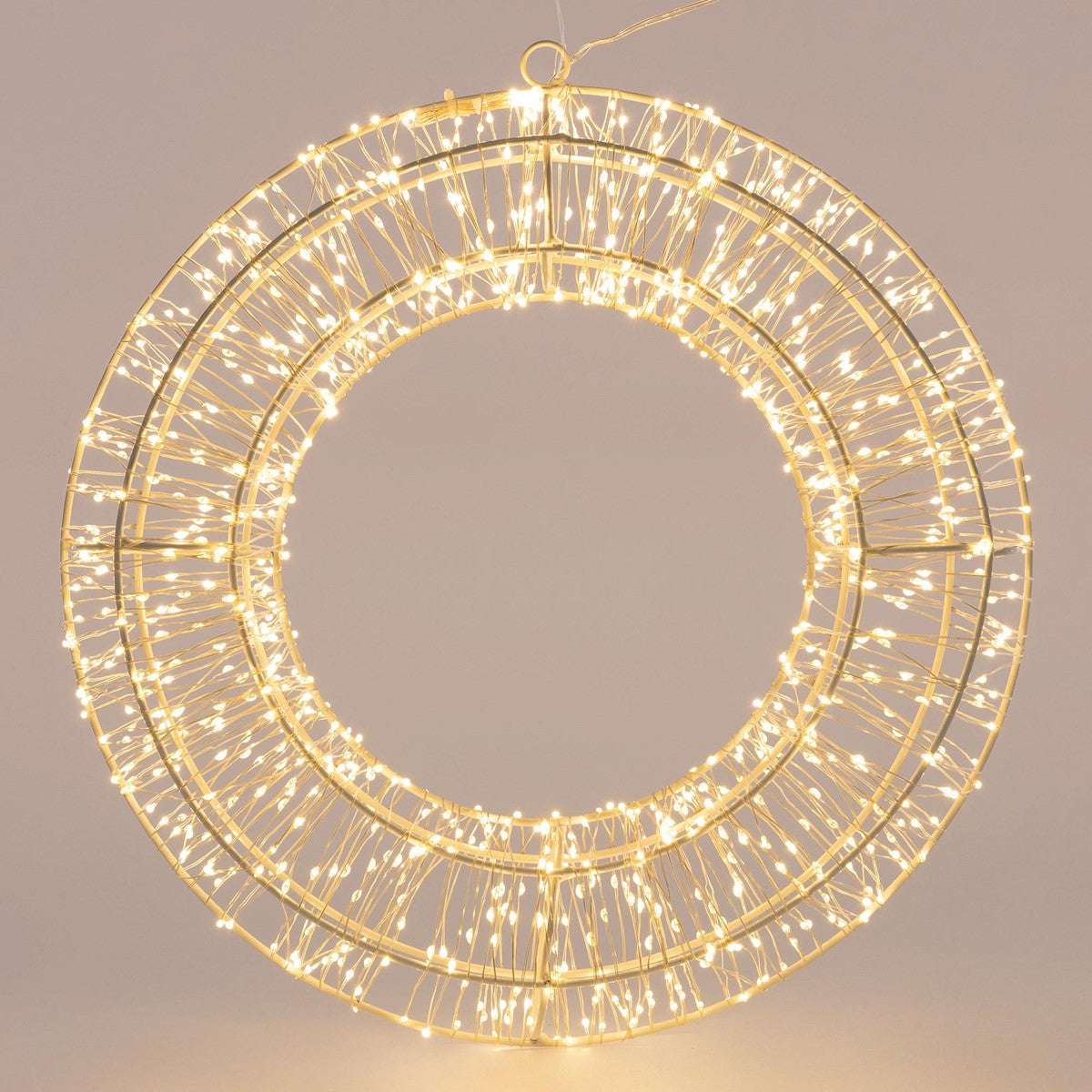 Cornice circolare con fili luminosi.