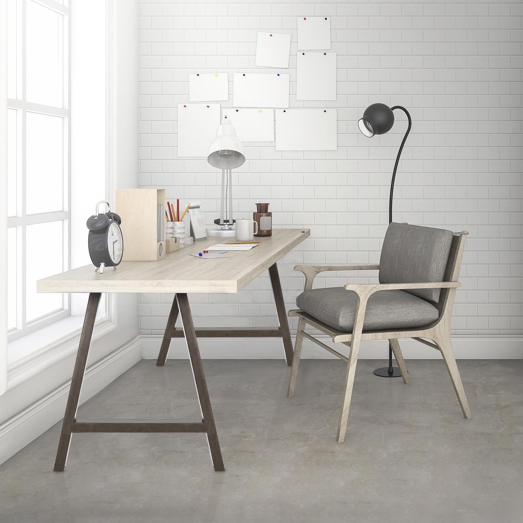 Ein moderner Schreibtisch mit Stuhl, Lampe und Notizen an der Wand.