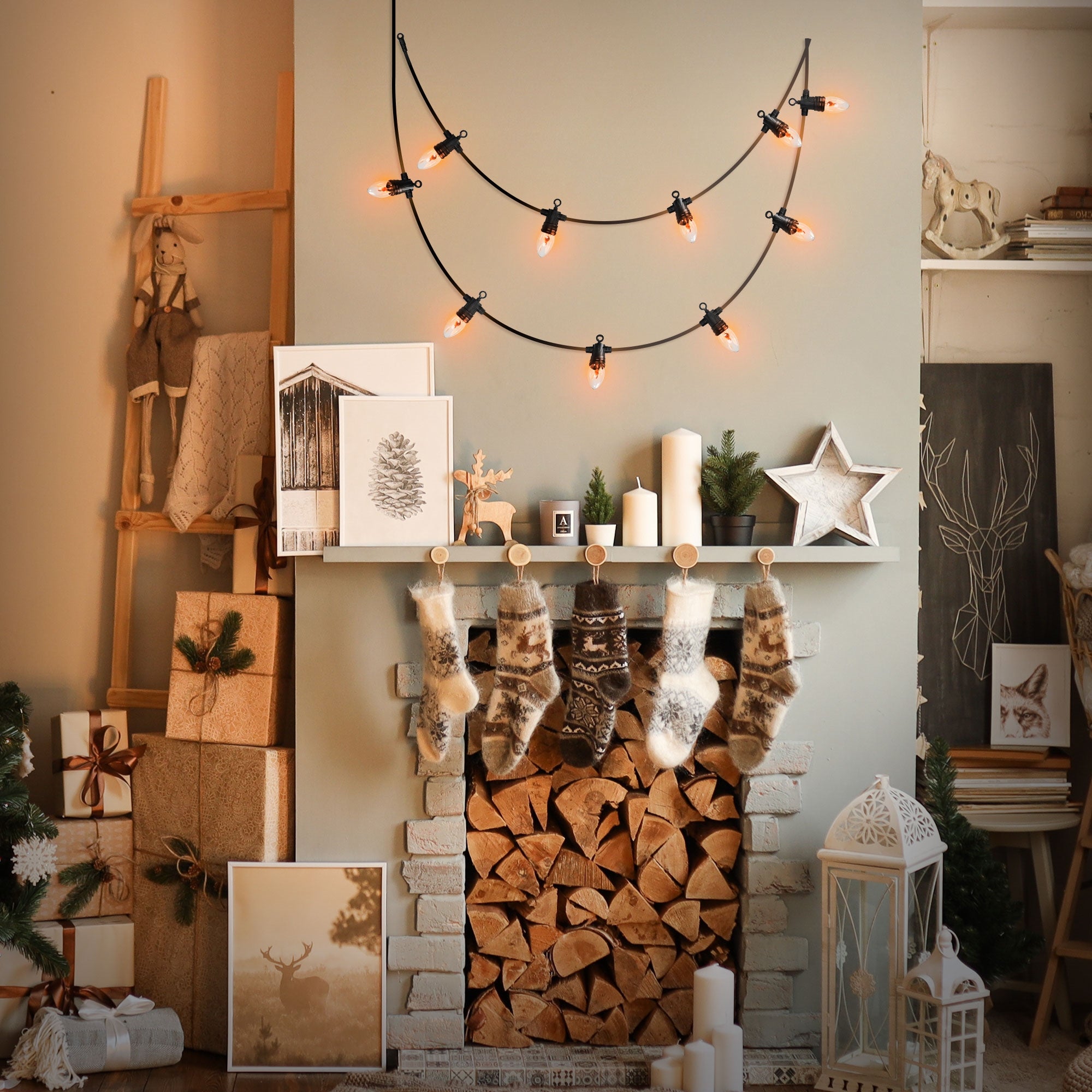 Cozy living room corner with string lights over a fireplace and Christmas decoration.