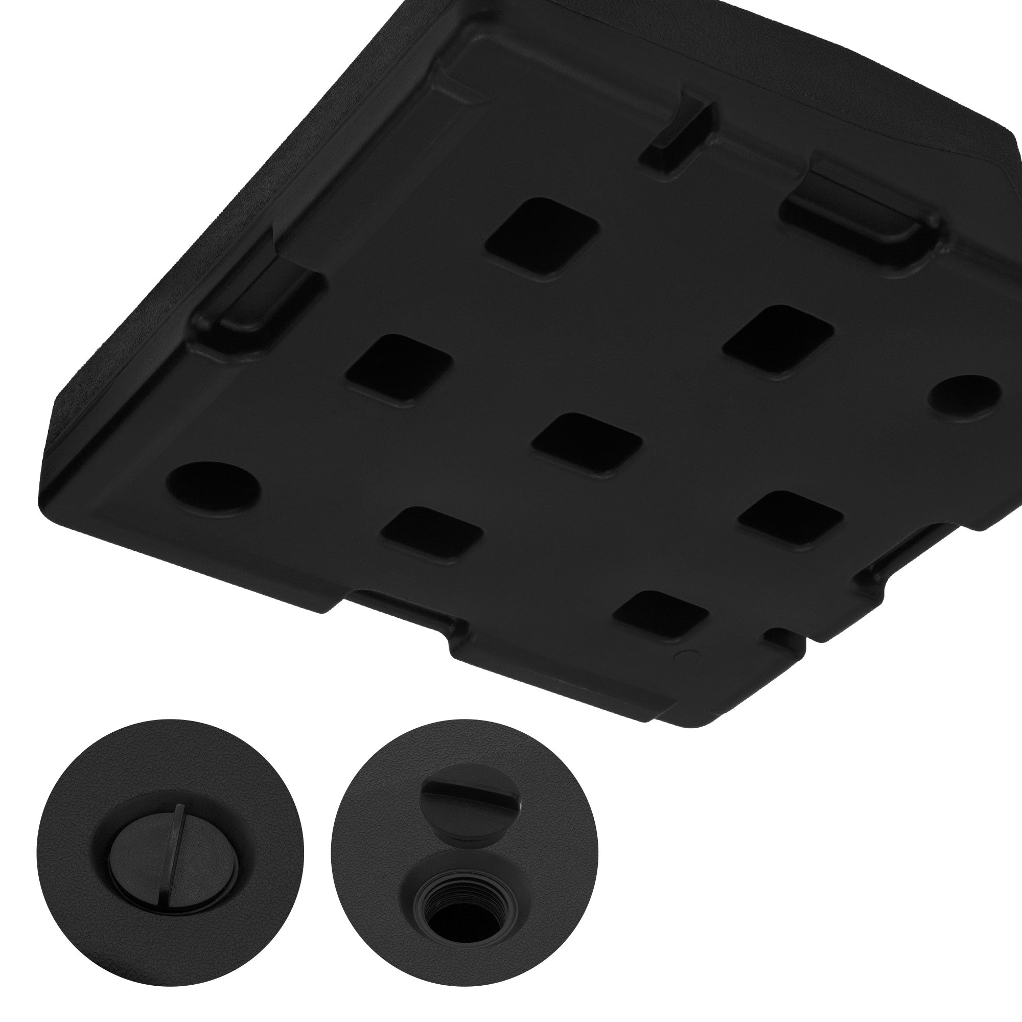 Underside of a black plate with two openings.