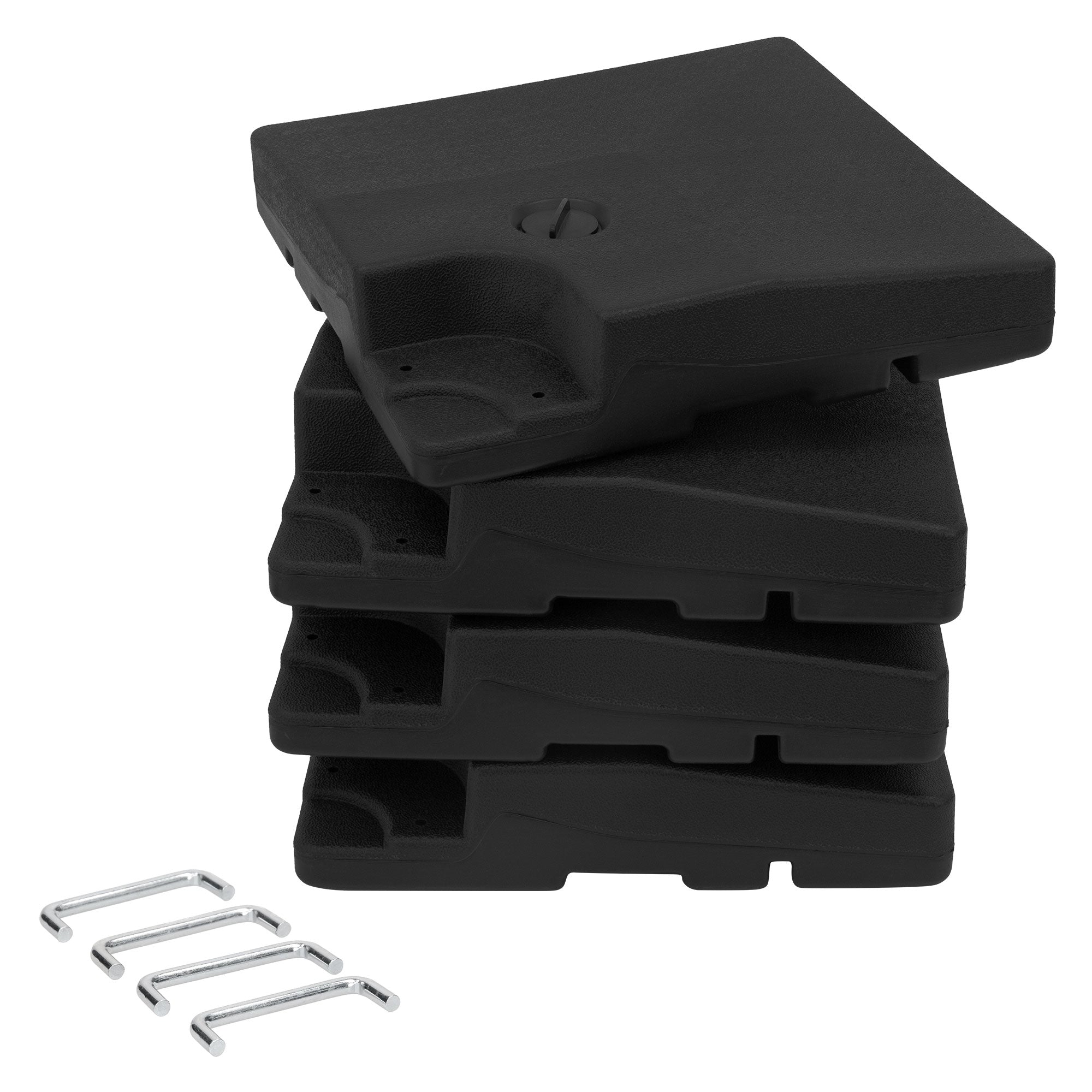 Four black plates stacked on top of each other, next to three metal clips.