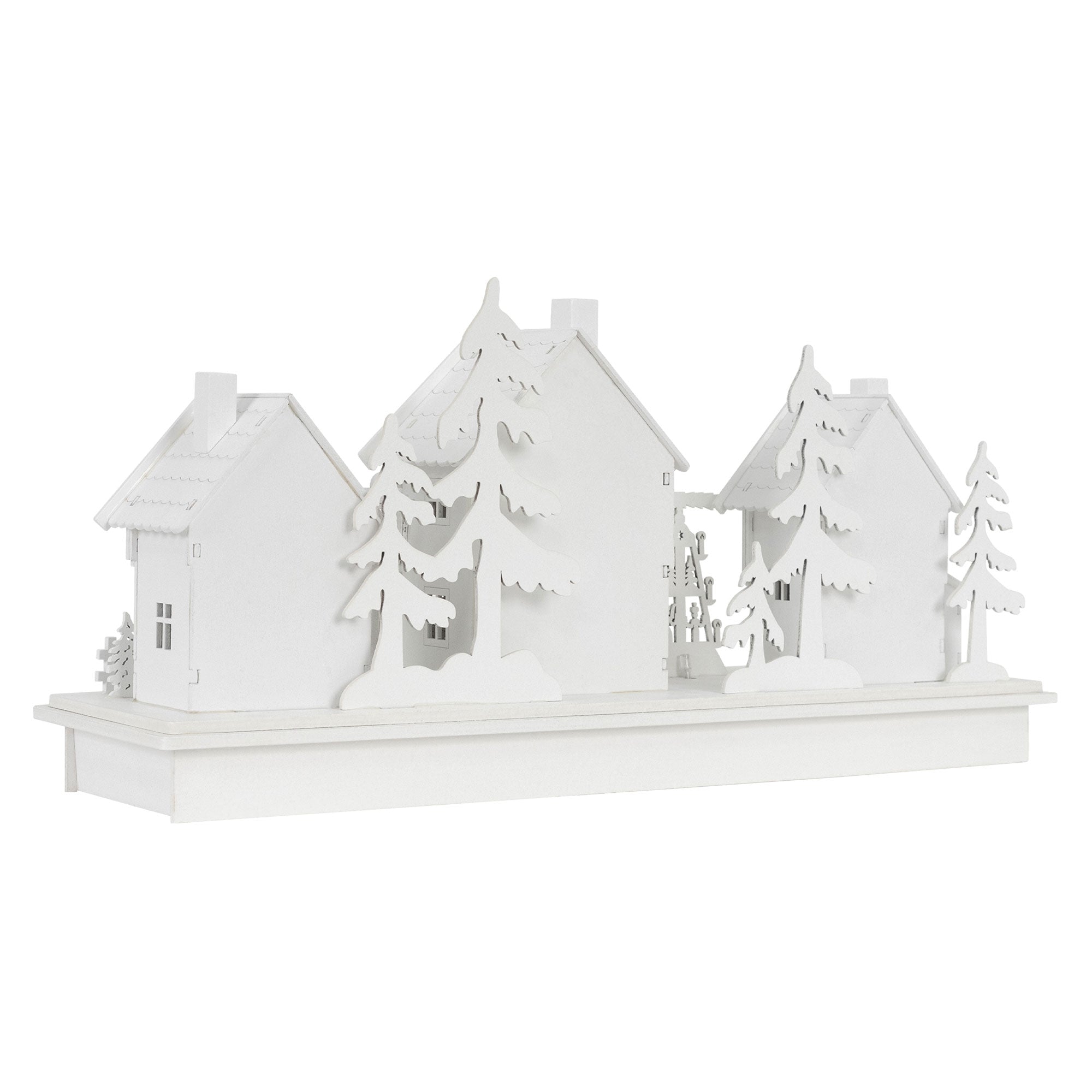 Drie witte huizen met bomen op een basis, zonder verlichting.