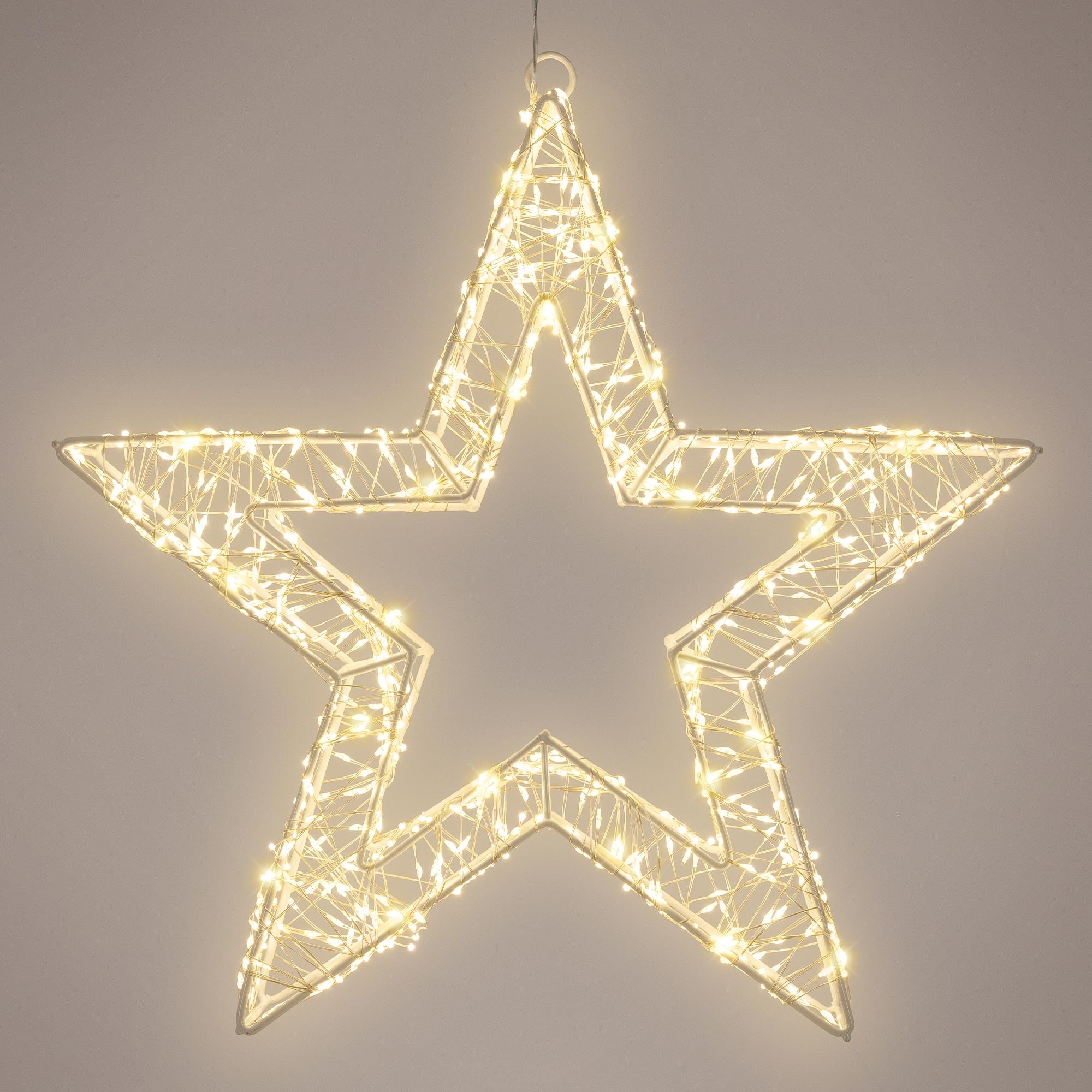 Étoile lumineuse transparente avec de nombreuses lumières.
