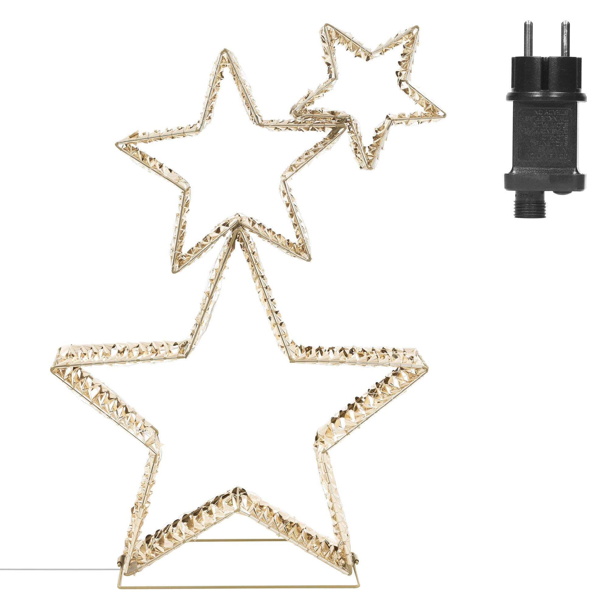 Zwei leuchtende Sterne in Gold auf einem Sockel, daneben ein Stecker.