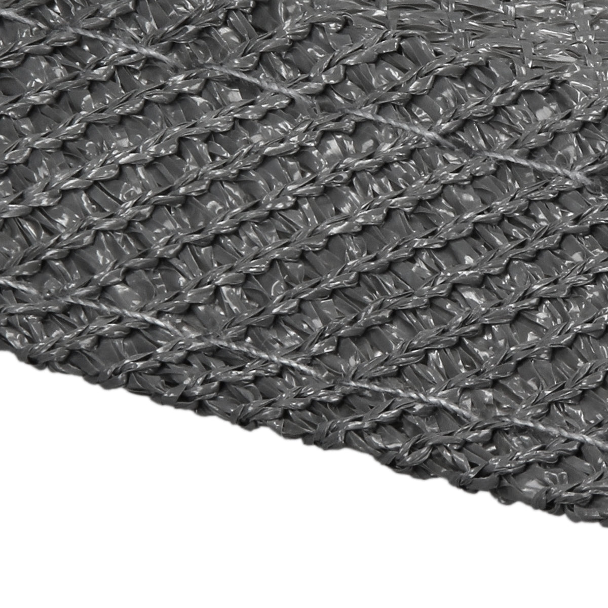 Detailní záběr šedého tkaného materiálu.