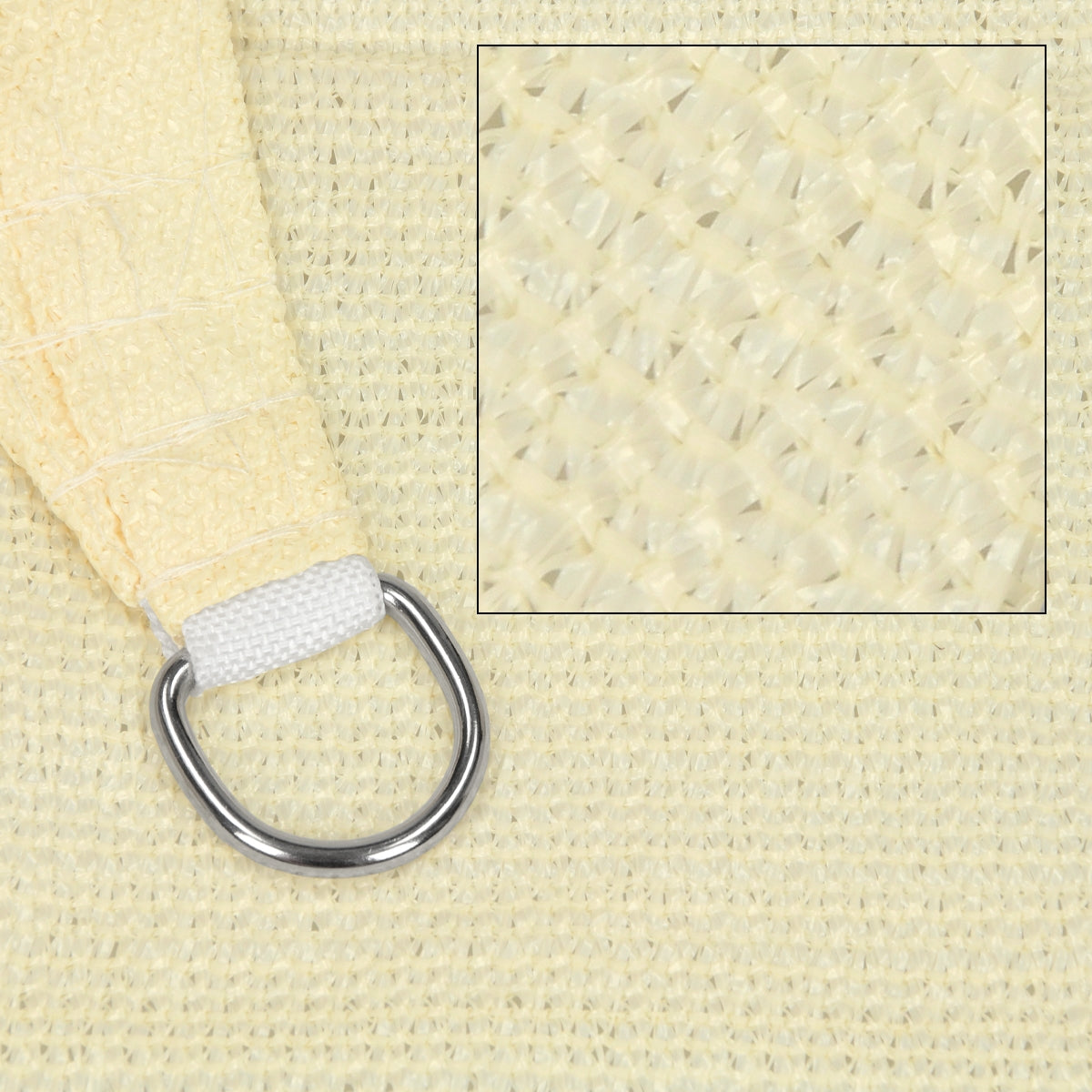 Close-up of a cream-colored fabric with a metal ring.