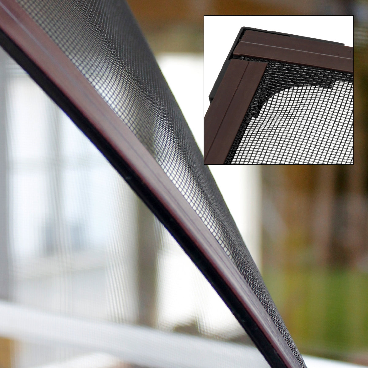 Close-up of a black insect protection screen in a window frame.