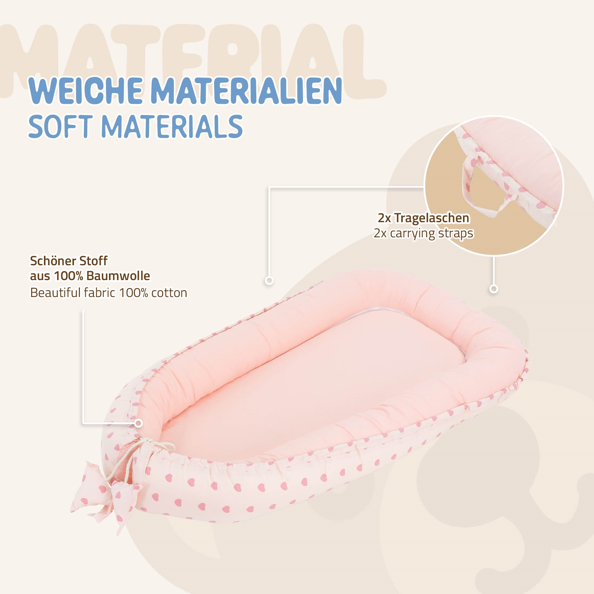 Babybett in Rosa mit Herzen und zwei Tragelaschen aus 100% Baumwolle.