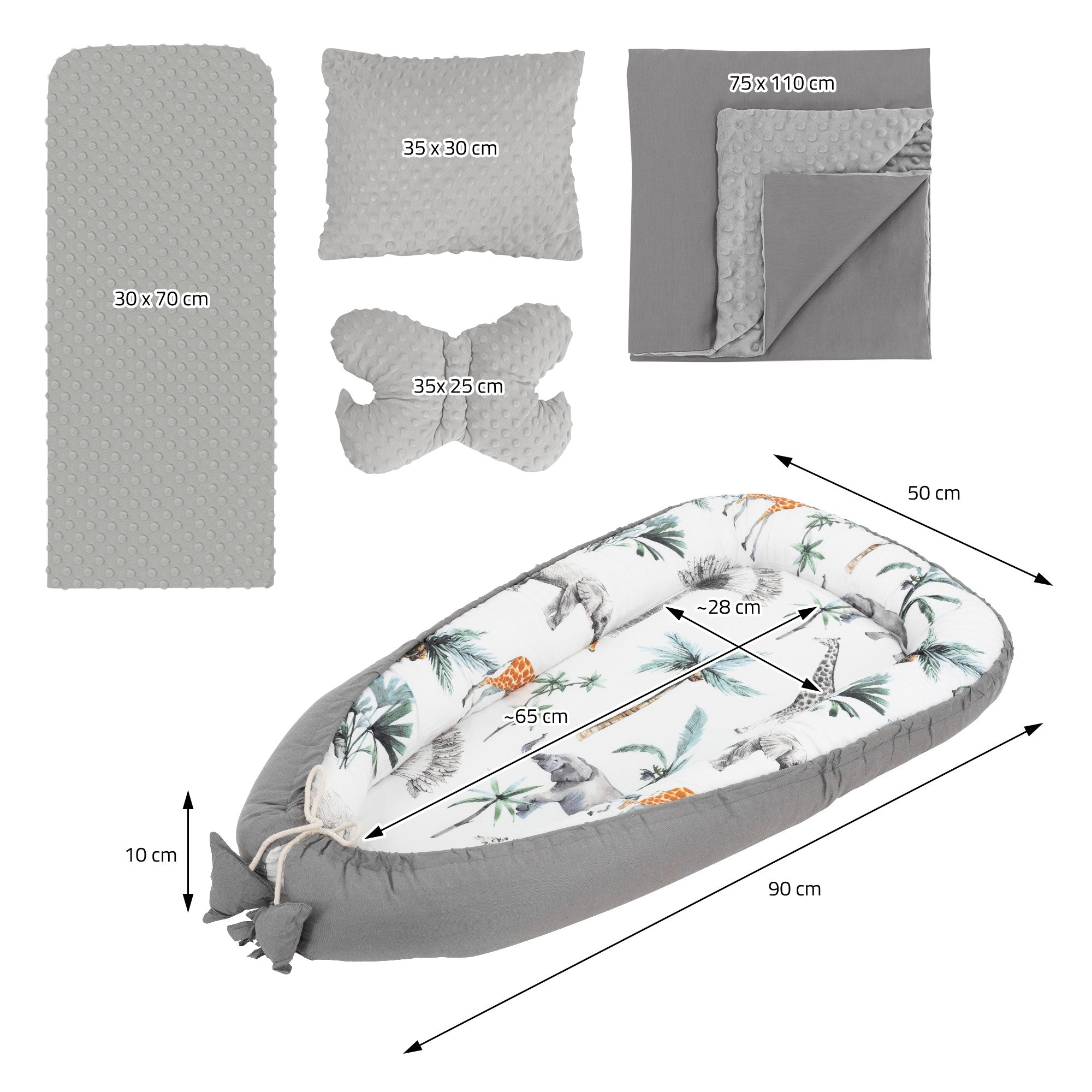 Ensemble avec nid, coussin et couverture en gris avec motif tropical.