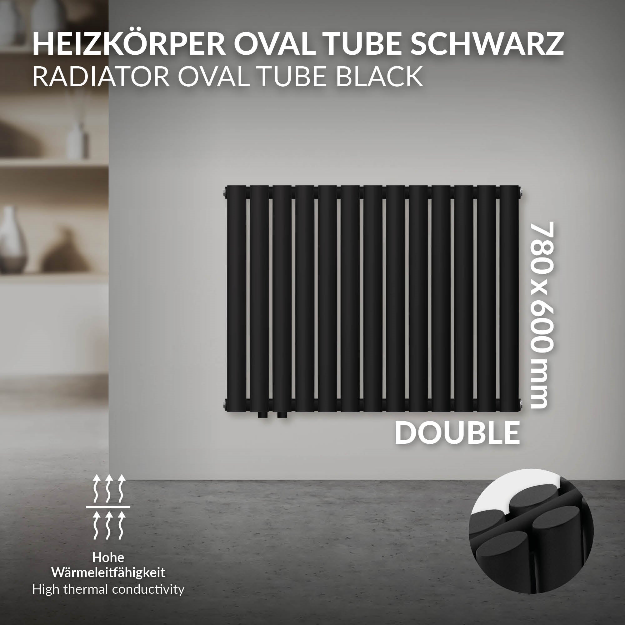Zwarte radiator met ovale buizen, zonder zichtbare muur.