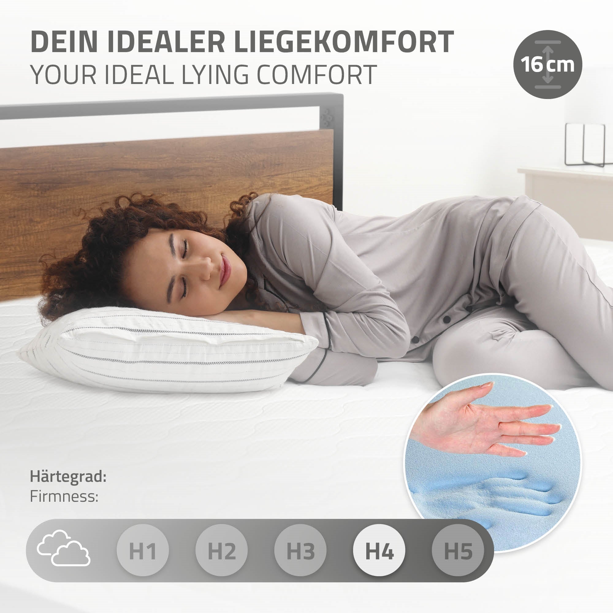 Einzelbett aus Metall mit Lattenrost und Matratze.