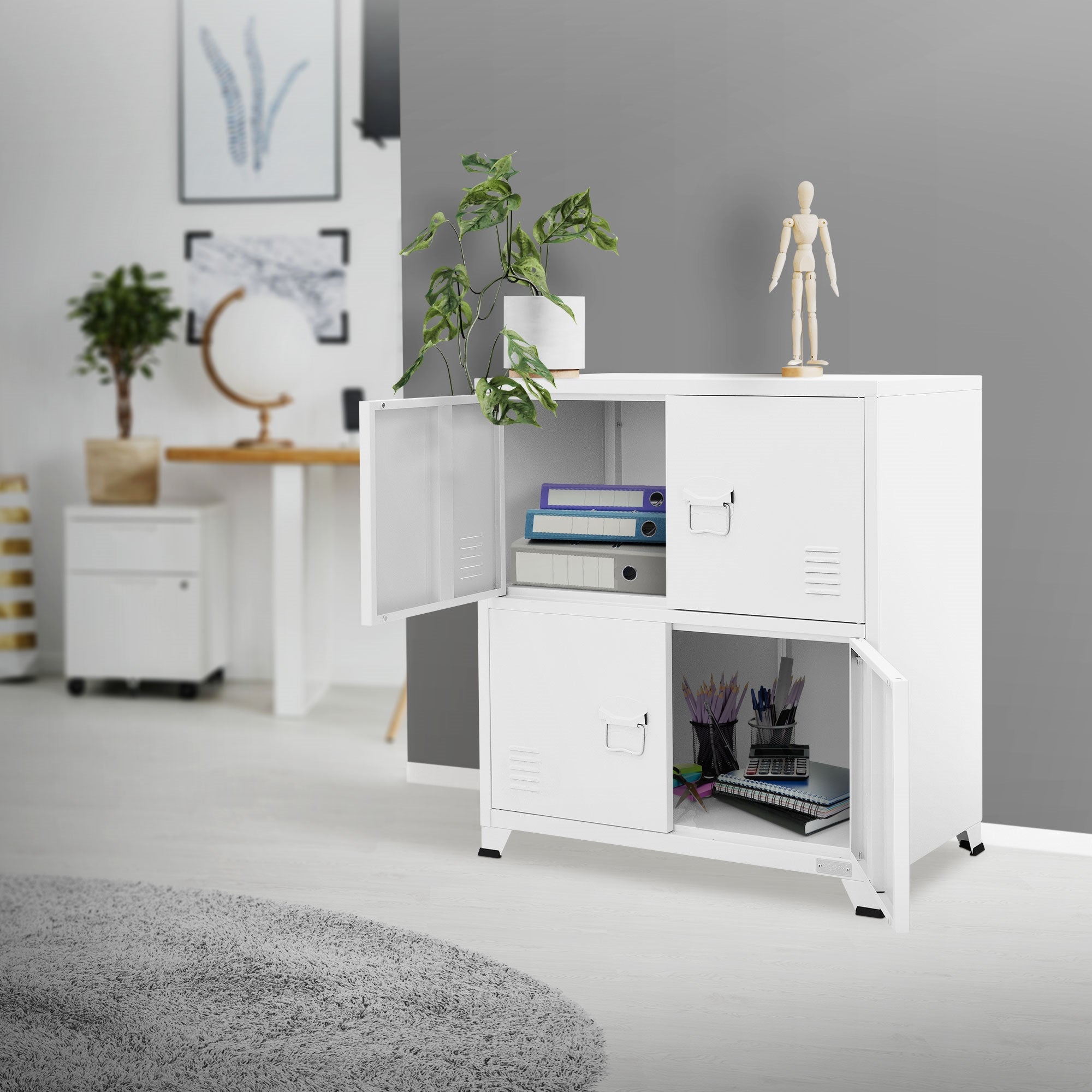 White cabinet with open doors, plants, and a figure on top.