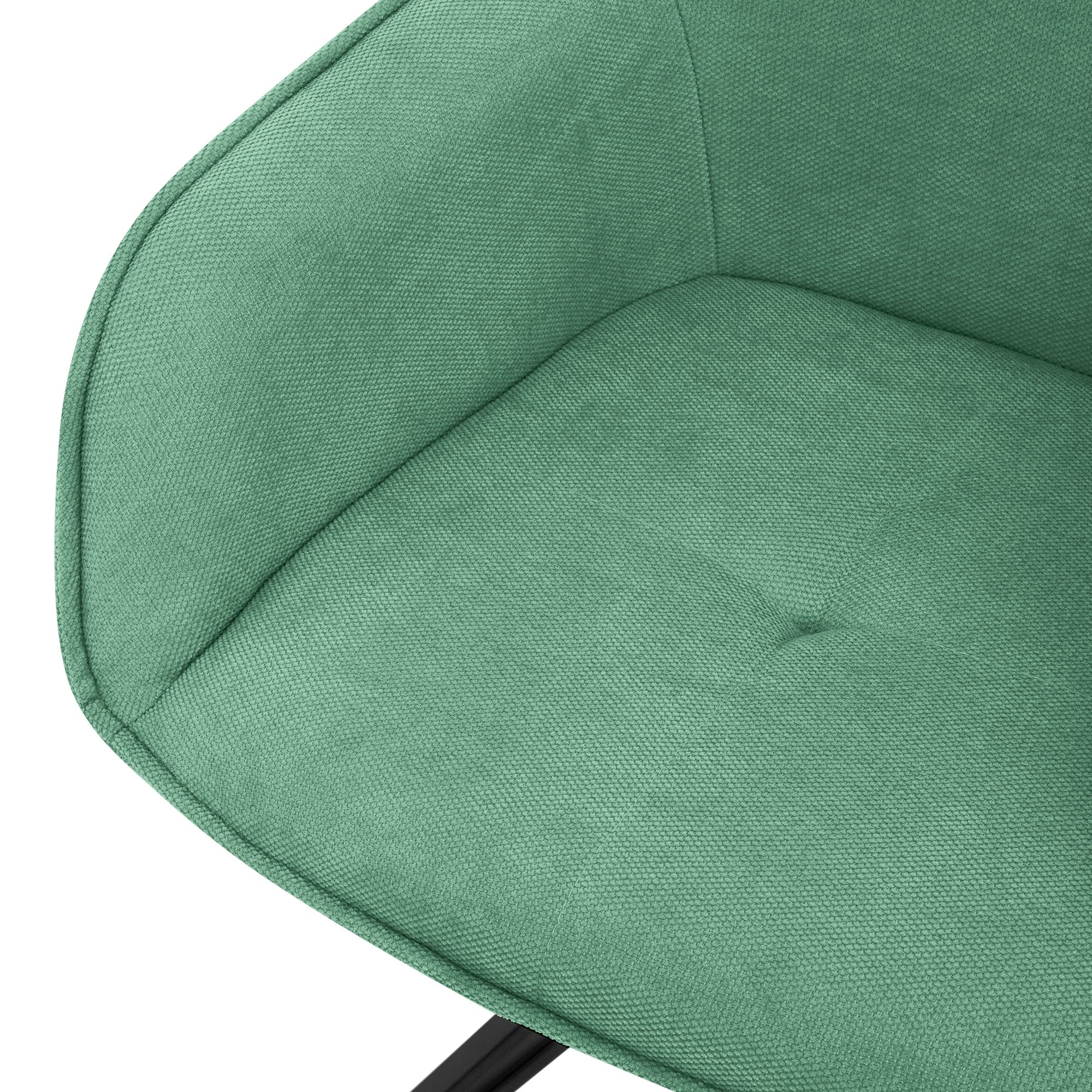 Primer plano de una silla verde con un asiento acolchado.